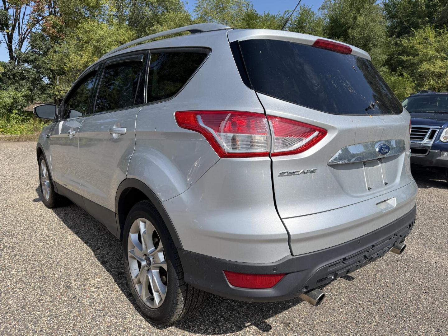 2016 Ford Escape Titanium FWD (1FMCU0JX0GU) with an 1.6L L4 DOHC 16V engine, 6-Speed Automatic transmission, located at 17255 hwy 65 NE, Ham Lake, MN, 55304, 0.000000, 0.000000 - Photo#2