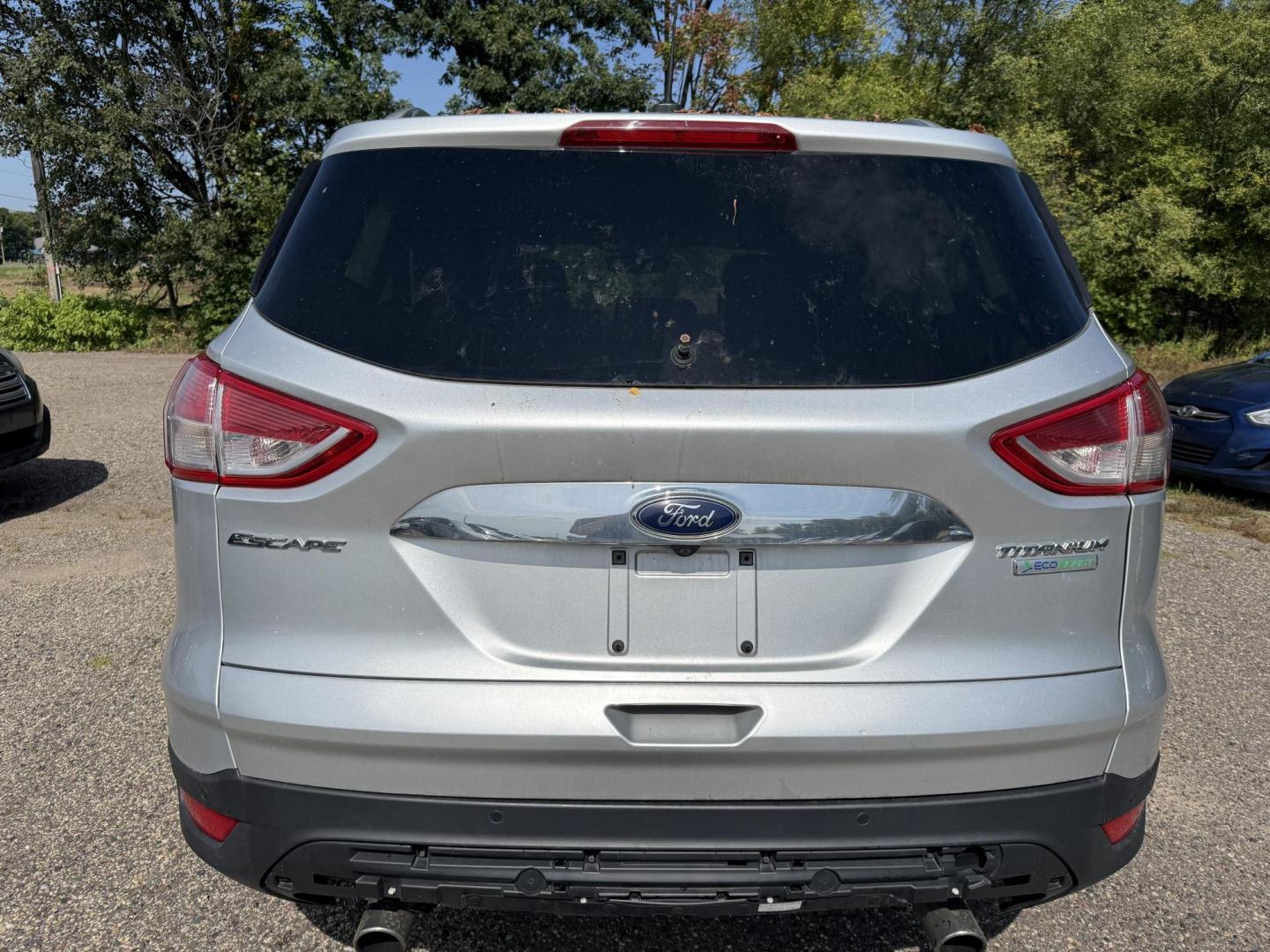 2016 Ford Escape Titanium FWD (1FMCU0JX0GU) with an 1.6L L4 DOHC 16V engine, 6-Speed Automatic transmission, located at 17255 hwy 65 NE, Ham Lake, MN, 55304, 0.000000, 0.000000 - Photo#3