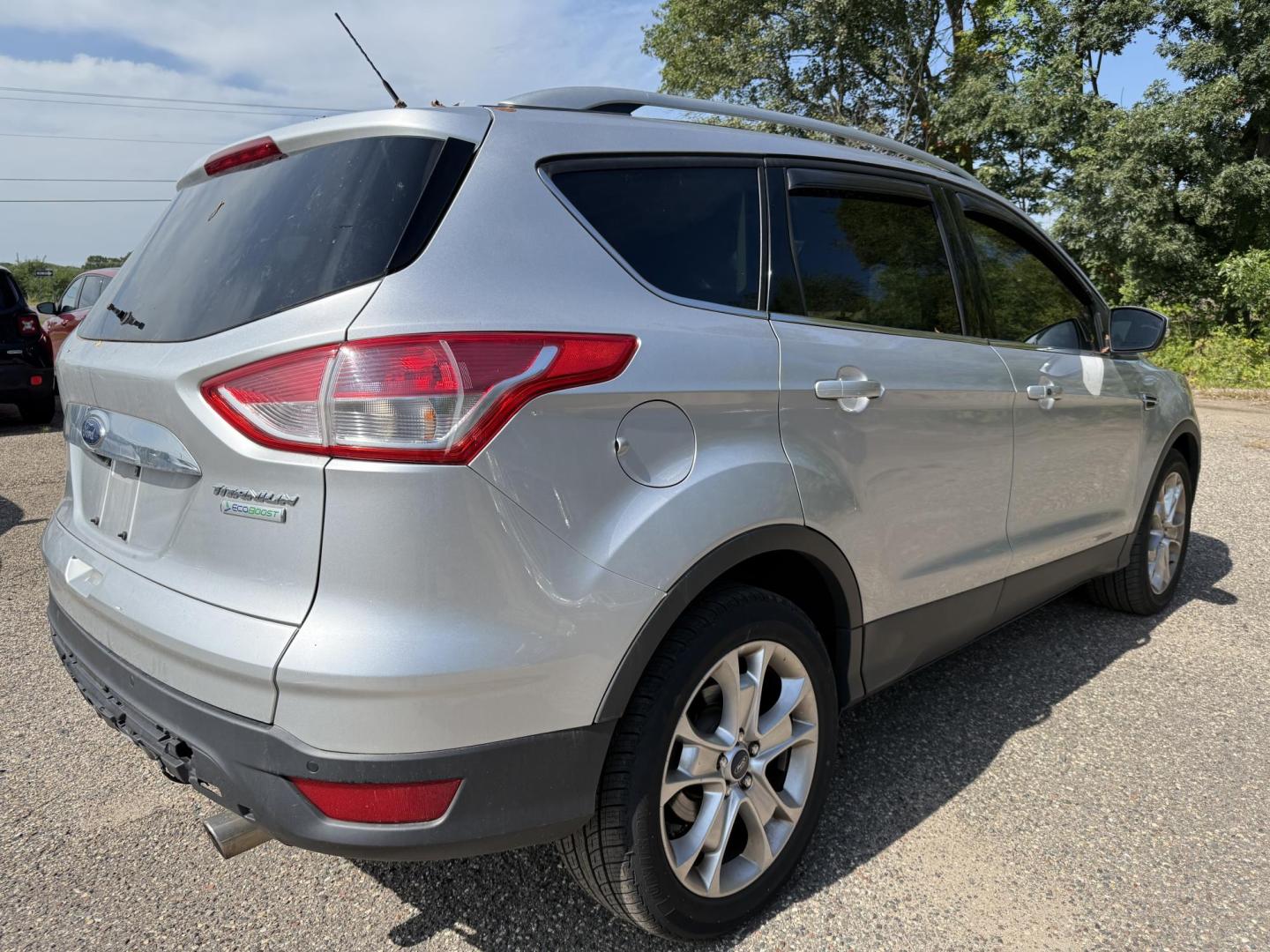 2016 Ford Escape Titanium FWD (1FMCU0JX0GU) with an 1.6L L4 DOHC 16V engine, 6-Speed Automatic transmission, located at 17255 hwy 65 NE, Ham Lake, MN, 55304, 0.000000, 0.000000 - Photo#4
