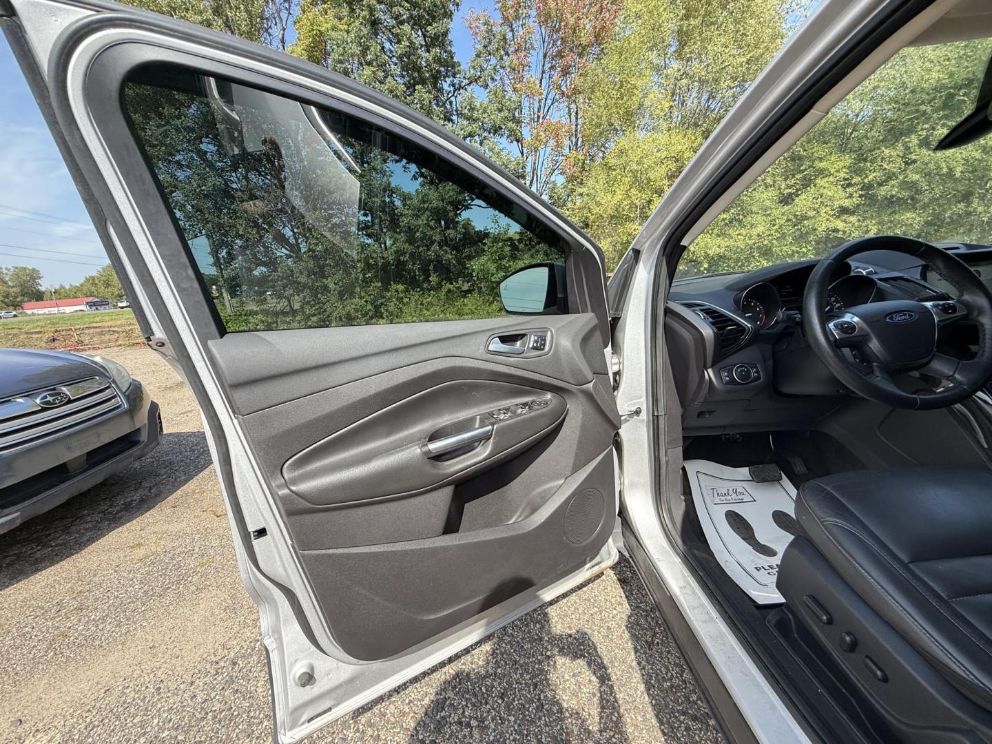 2016 Ford Escape Titanium FWD (1FMCU0JX0GU) with an 1.6L L4 DOHC 16V engine, 6-Speed Automatic transmission, located at 17255 hwy 65 NE, Ham Lake, MN, 55304, 0.000000, 0.000000 - Photo#8