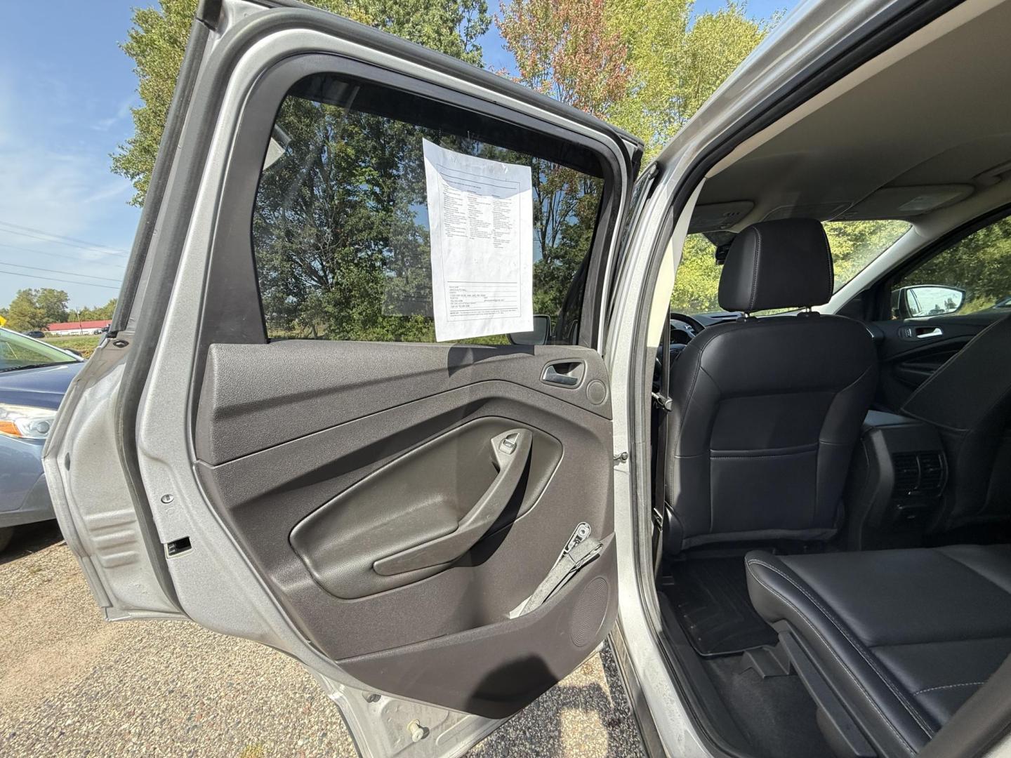 2016 Ford Escape Titanium FWD (1FMCU0JX0GU) with an 1.6L L4 DOHC 16V engine, 6-Speed Automatic transmission, located at 17255 hwy 65 NE, Ham Lake, MN, 55304, 0.000000, 0.000000 - Photo#10