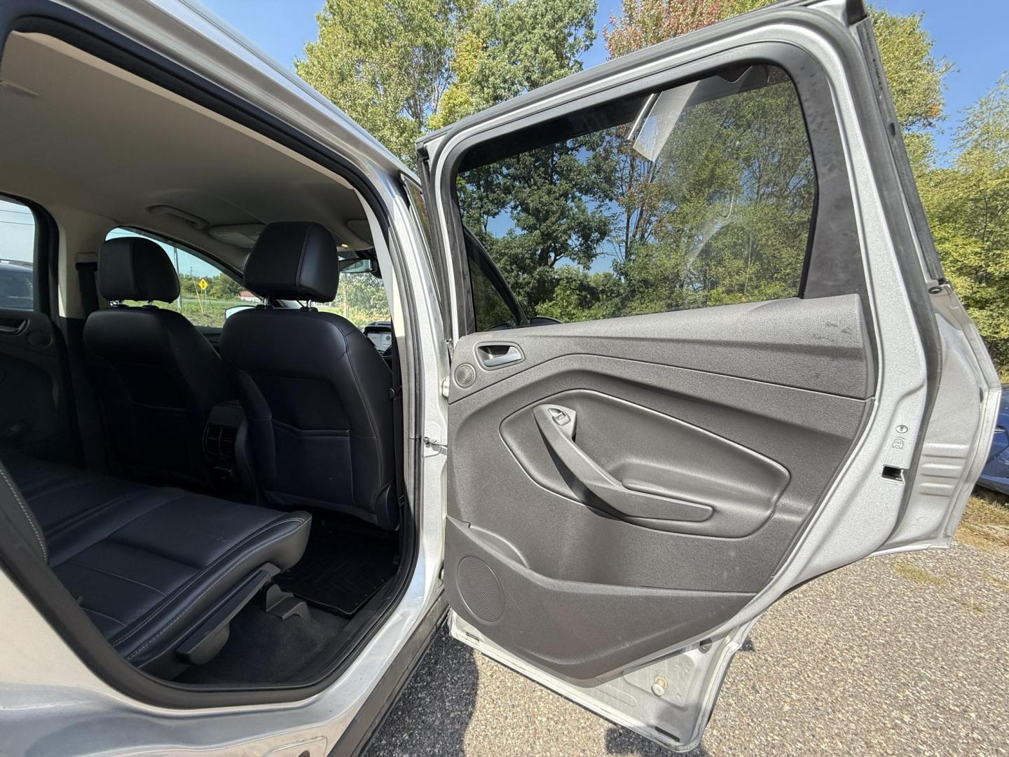 2016 Ford Escape Titanium FWD (1FMCU0JX0GU) with an 1.6L L4 DOHC 16V engine, 6-Speed Automatic transmission, located at 17255 hwy 65 NE, Ham Lake, MN, 55304, 0.000000, 0.000000 - Photo#12