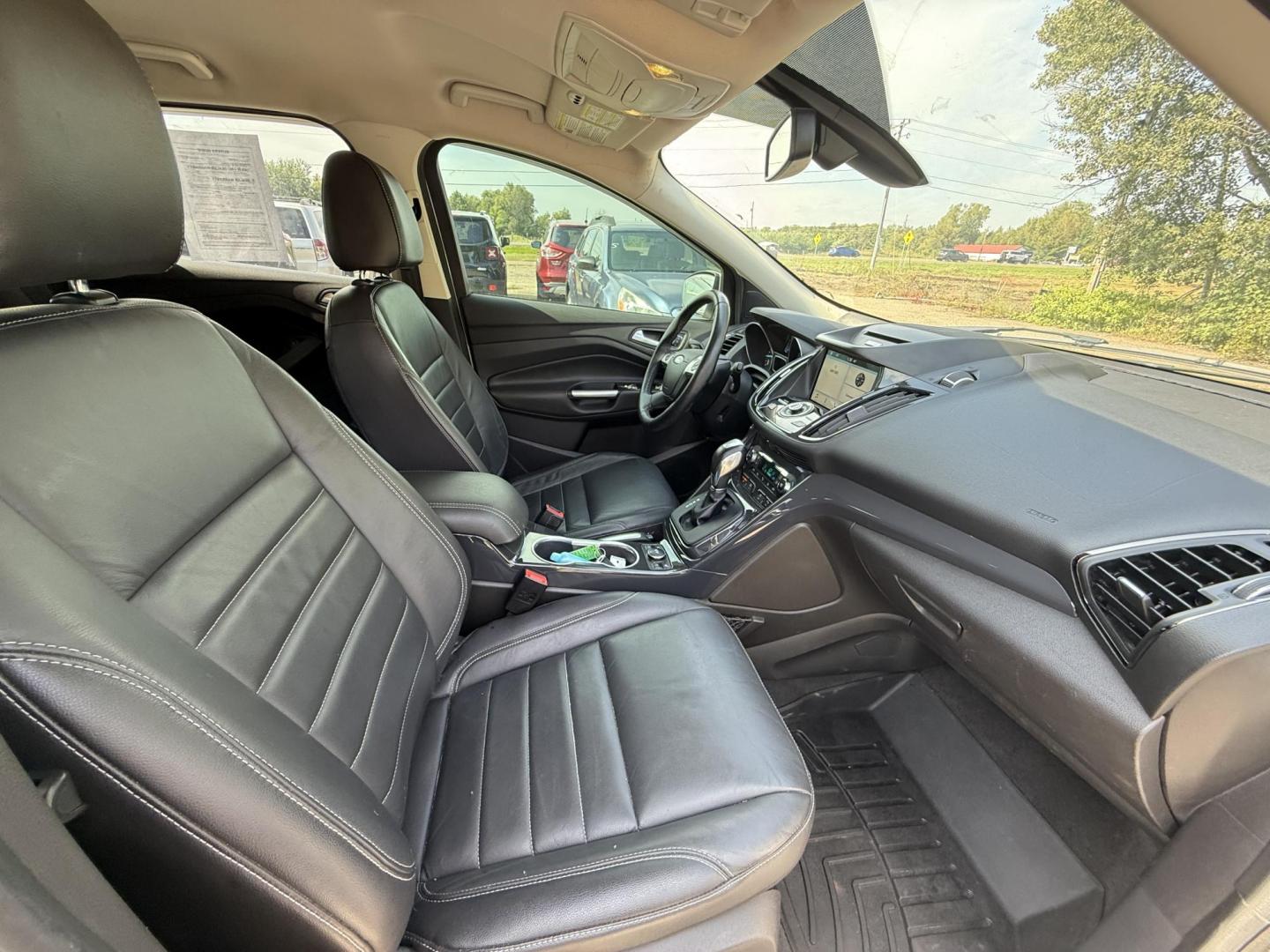 2016 Ford Escape Titanium FWD (1FMCU0JX0GU) with an 1.6L L4 DOHC 16V engine, 6-Speed Automatic transmission, located at 17255 hwy 65 NE, Ham Lake, MN, 55304, 0.000000, 0.000000 - Photo#15