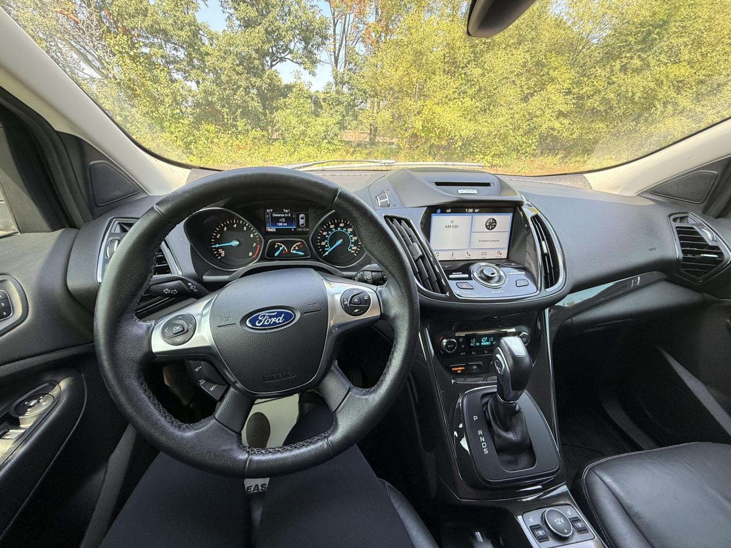 2016 Ford Escape Titanium FWD (1FMCU0JX0GU) with an 1.6L L4 DOHC 16V engine, 6-Speed Automatic transmission, located at 17255 hwy 65 NE, Ham Lake, MN, 55304, 0.000000, 0.000000 - Photo#16