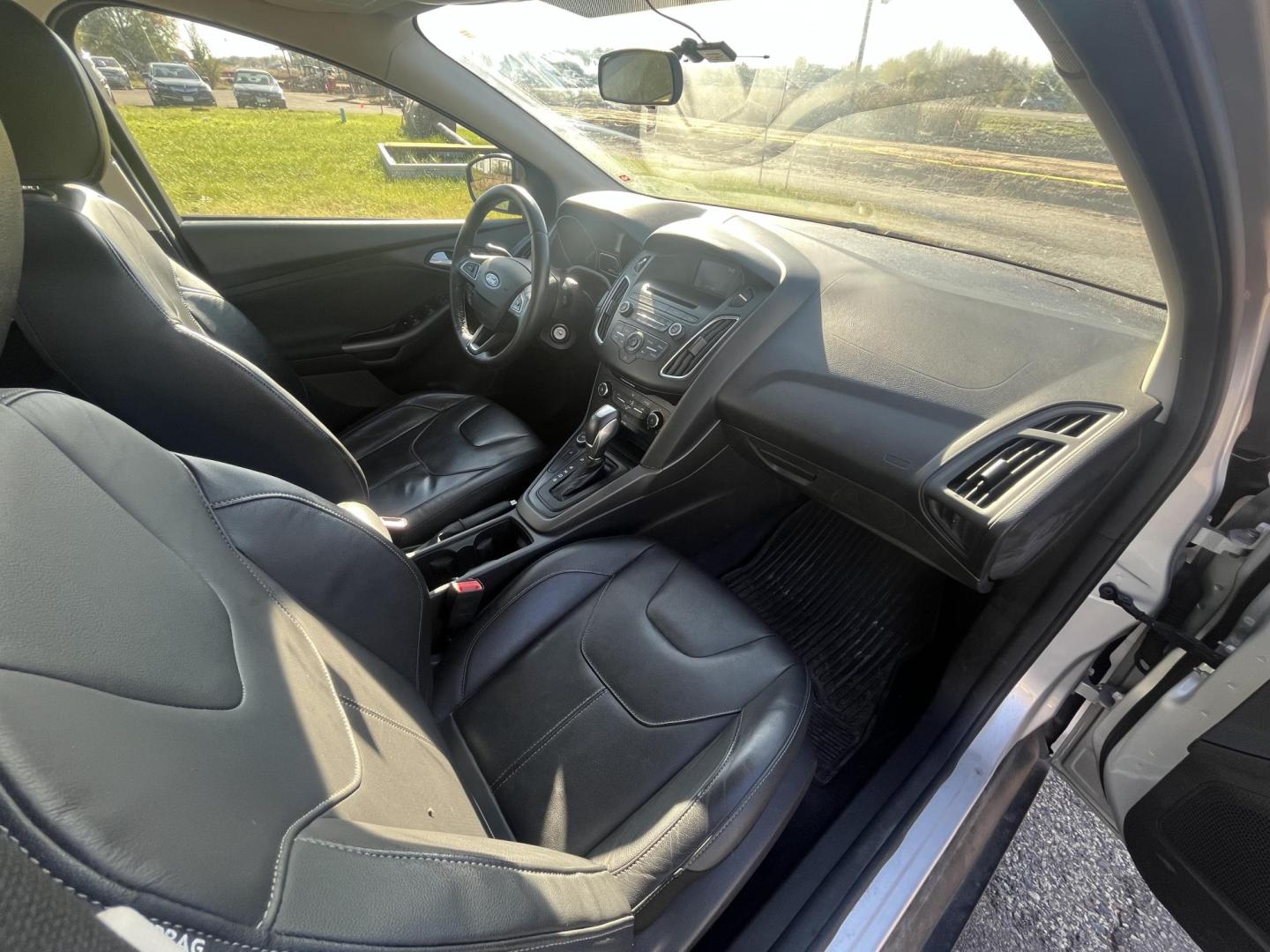 2015 Ford Focus SE Sedan (1FADP3F22FL) with an 2.0L L4 DOHC 16V engine, located at 17255 hwy 65 NE, Ham Lake, MN, 55304, 0.000000, 0.000000 - Photo#13