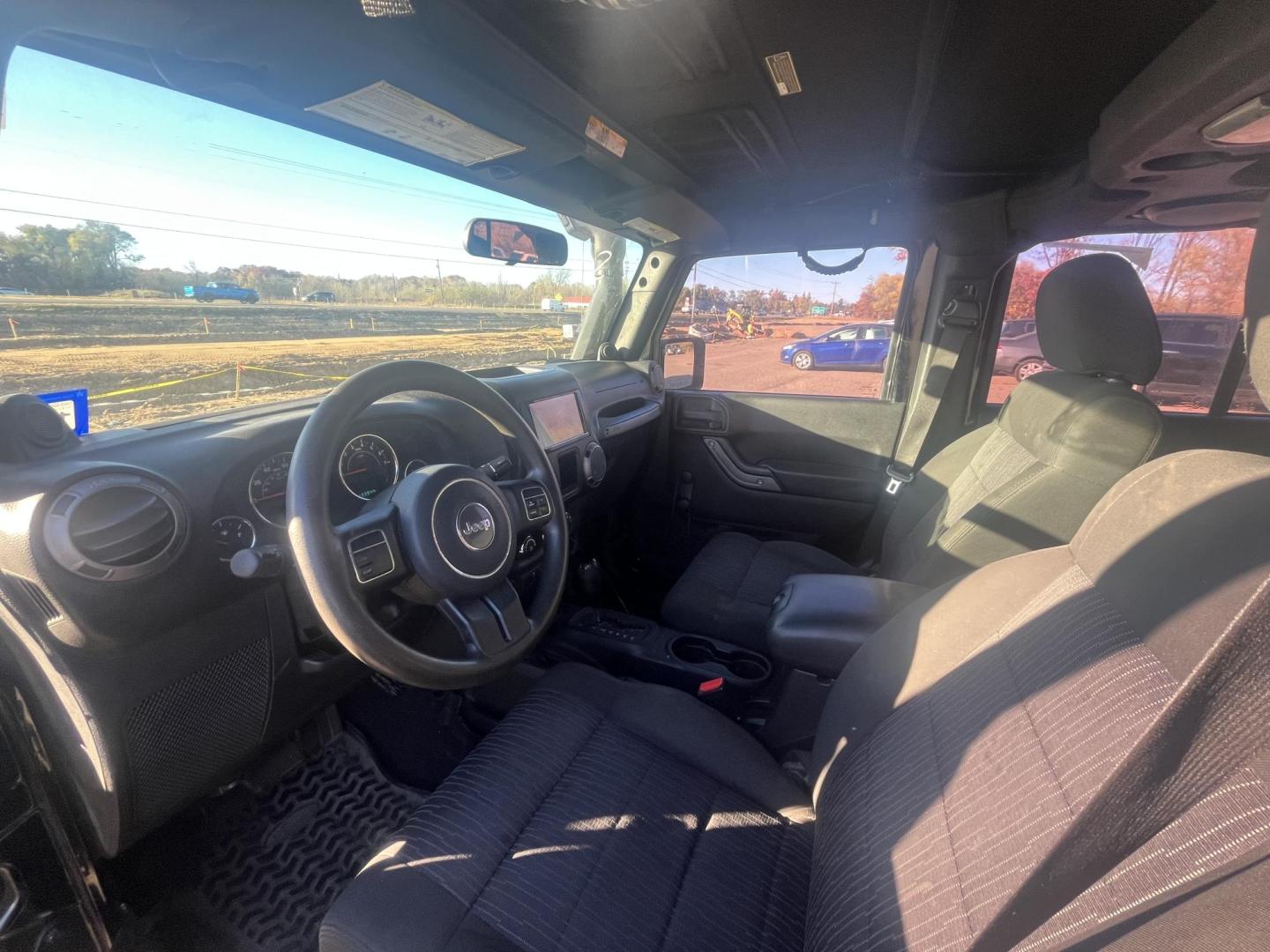 2011 Jeep Wrangler Unlimited Sport 4WD (1J4BA3H14BL) with an 3.8L V6 OHV 12V engine, located at 17255 hwy 65 NE, Ham Lake, MN, 55304, 0.000000, 0.000000 - Photo#9