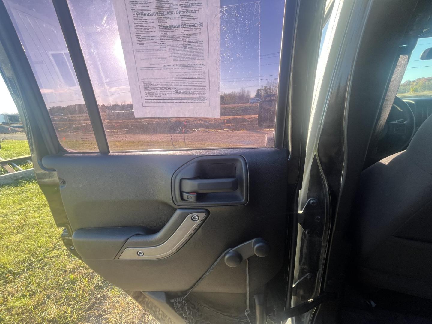 2011 Jeep Wrangler Unlimited Sport 4WD (1J4BA3H14BL) with an 3.8L V6 OHV 12V engine, located at 17255 hwy 65 NE, Ham Lake, MN, 55304, 0.000000, 0.000000 - Photo#10