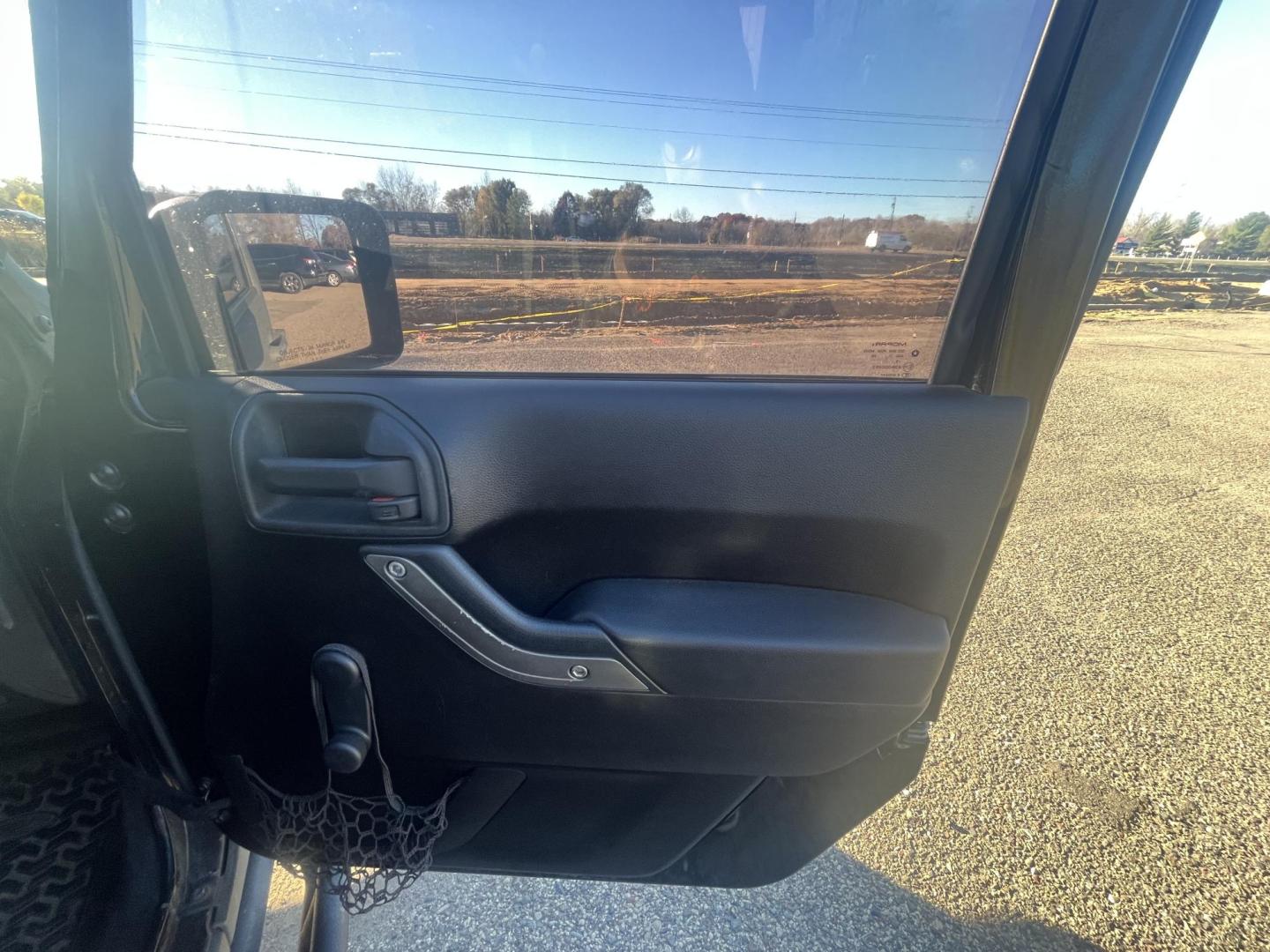 2011 Jeep Wrangler Unlimited Sport 4WD (1J4BA3H14BL) with an 3.8L V6 OHV 12V engine, located at 17255 hwy 65 NE, Ham Lake, MN, 55304, 0.000000, 0.000000 - Photo#12