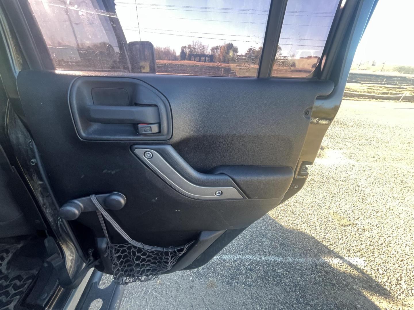 2011 Jeep Wrangler Unlimited Sport 4WD (1J4BA3H14BL) with an 3.8L V6 OHV 12V engine, located at 17255 hwy 65 NE, Ham Lake, MN, 55304, 0.000000, 0.000000 - Photo#14