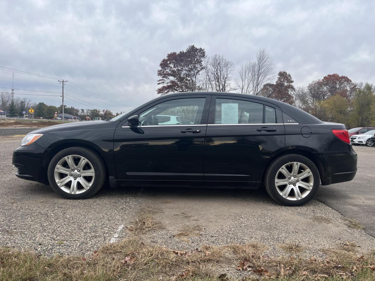 2011 Chrysler 200 Touring (1C3BC1FB5BN) with an 2.4L L4 DOHC 16V engine, 6-Speed Automatic transmission, located at 17255 hwy 65 NE, Ham Lake, MN, 55304, 0.000000, 0.000000 - Photo#1