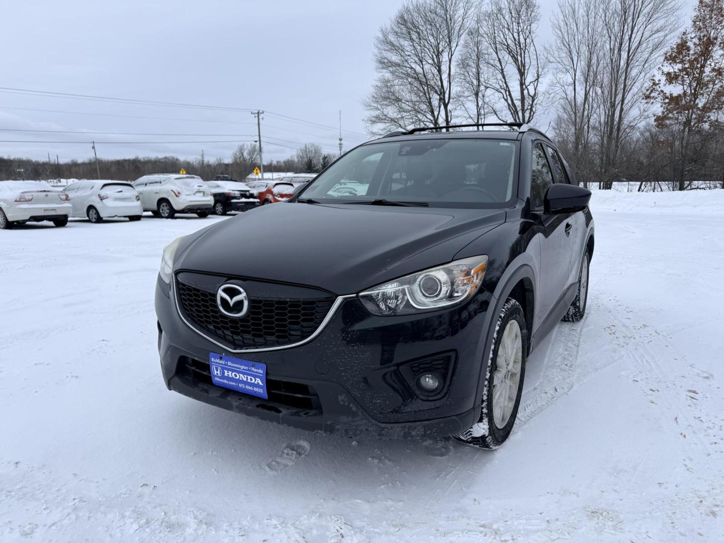 2014 Mazda CX-5 Grand Touring AWD (JM3KE4DY3E0) with an 2.5L L4 DOHC 16V engine, 6-Speed Automatic transmission, located at 17255 hwy 65 NE, Ham Lake, MN, 55304, 0.000000, 0.000000 - Photo#0