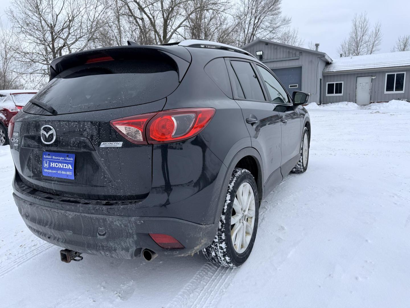 2014 Mazda CX-5 Grand Touring AWD (JM3KE4DY3E0) with an 2.5L L4 DOHC 16V engine, 6-Speed Automatic transmission, located at 17255 hwy 65 NE, Ham Lake, MN, 55304, 0.000000, 0.000000 - Photo#4