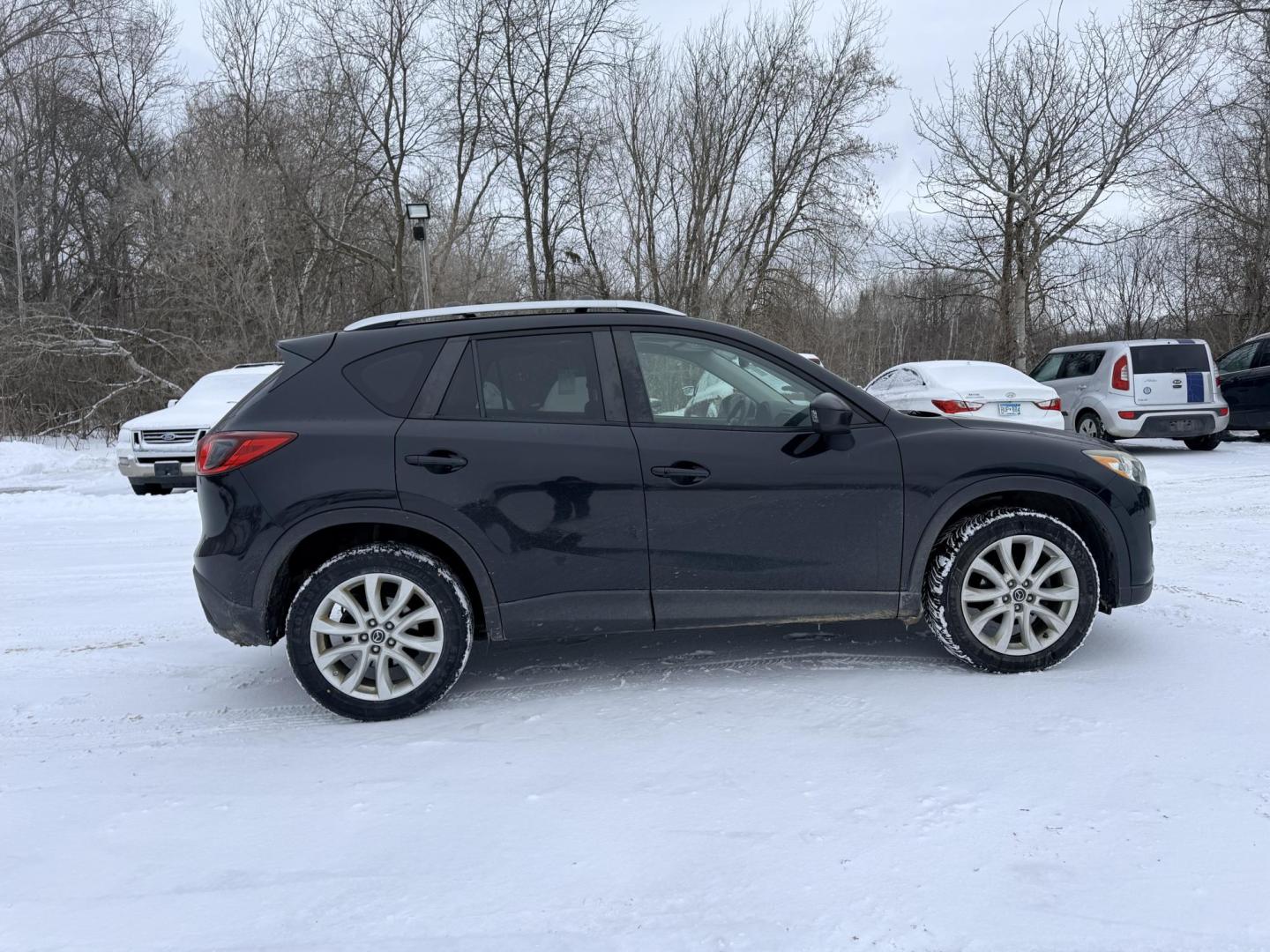 2014 Mazda CX-5 Grand Touring AWD (JM3KE4DY3E0) with an 2.5L L4 DOHC 16V engine, 6-Speed Automatic transmission, located at 17255 hwy 65 NE, Ham Lake, MN, 55304, 0.000000, 0.000000 - Photo#5