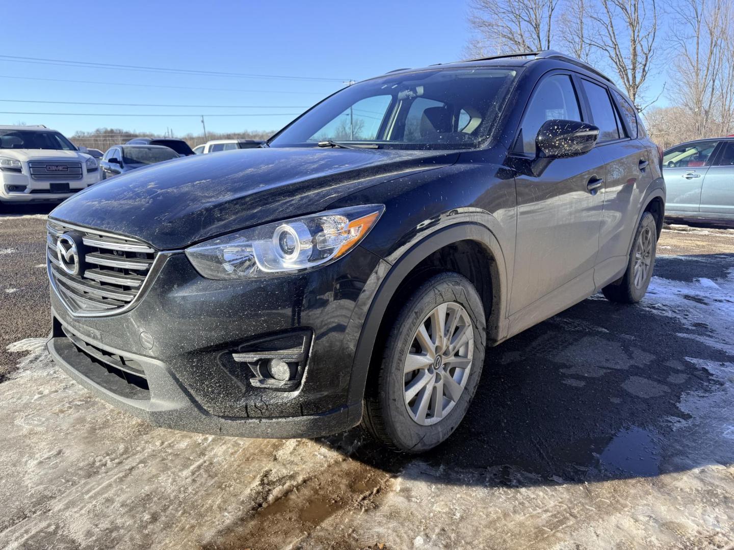 2016 Mazda CX-5 Touring AWD (JM3KE4CYXG0) with an 2.5L L4 DOHC 16V engine, 6-Speed Automatic transmission, located at 17255 hwy 65 NE, Ham Lake, MN, 55304, 0.000000, 0.000000 - Photo#0