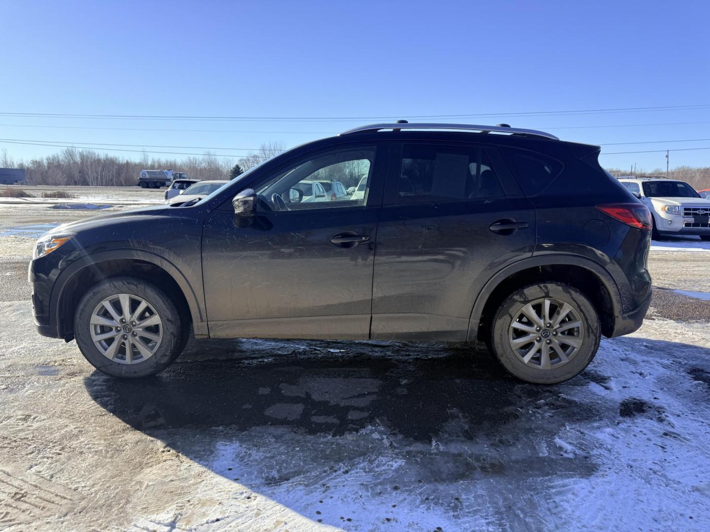2016 Mazda CX-5 Touring AWD (JM3KE4CYXG0) with an 2.5L L4 DOHC 16V engine, 6-Speed Automatic transmission, located at 17255 hwy 65 NE, Ham Lake, MN, 55304, 0.000000, 0.000000 - Photo#1