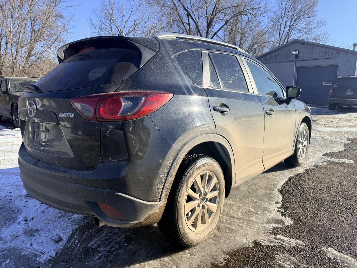 2016 Mazda CX-5 Touring AWD (JM3KE4CYXG0) with an 2.5L L4 DOHC 16V engine, 6-Speed Automatic transmission, located at 17255 hwy 65 NE, Ham Lake, MN, 55304, 0.000000, 0.000000 - Photo#4