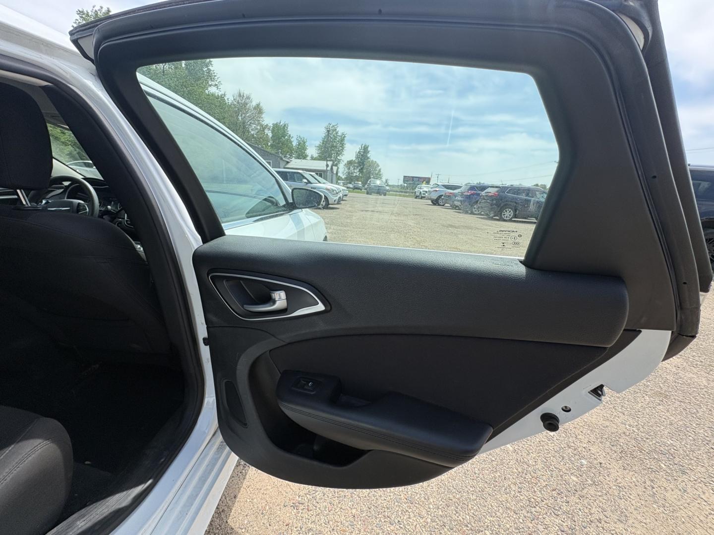 2015 Chrysler 200 Limited (1C3CCCAB7FN) with an 2.4L L4 DOHC 16V engine, 9-Speed Automatic transmission, located at 17255 hwy 65 NE, Ham Lake, MN, 55304, 0.000000, 0.000000 - Photo#12