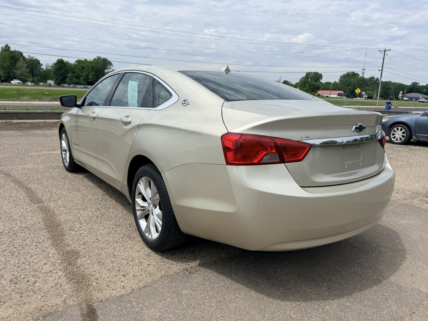 2014 Gold Chevrolet Impala with an 6 engine, located at 17255 hwy 65 NE, Ham Lake, MN, 55304, 0.000000, 0.000000- Photo#2