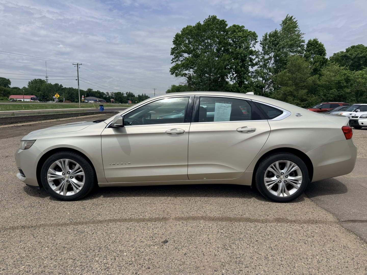 2014 Gold Chevrolet Impala with an 6 engine, located at 17255 hwy 65 NE, Ham Lake, MN, 55304, 0.000000, 0.000000- Photo#1