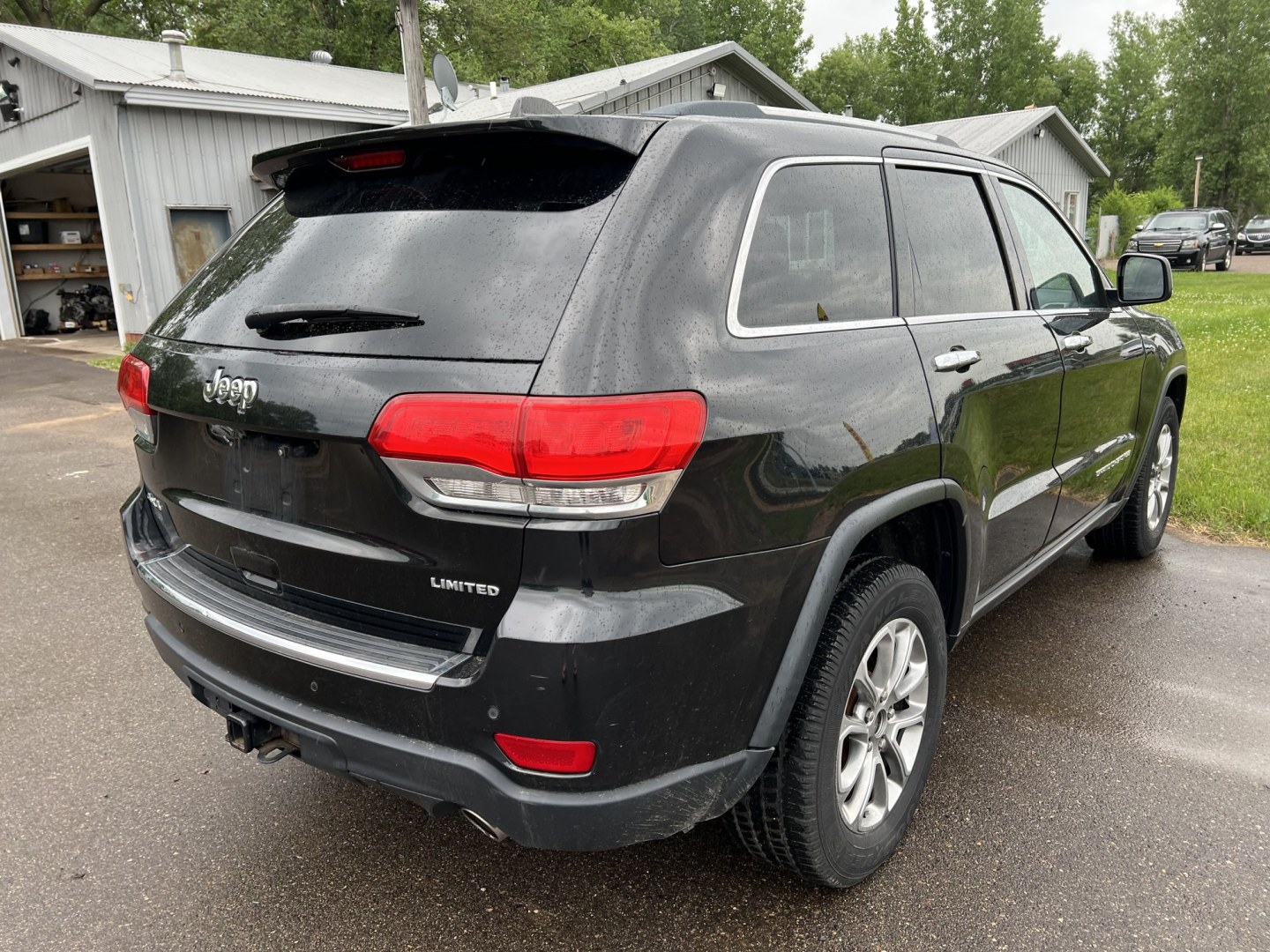 2015 Jeep Grand Cherokee Limited 4WD (1C4RJFBG8FC) with an 3.6L V6 DOHC 24V engine, 8-Speed Automatic transmission, located at 17255 hwy 65 NE, Ham Lake, MN, 55304, 0.000000, 0.000000 - Photo#4