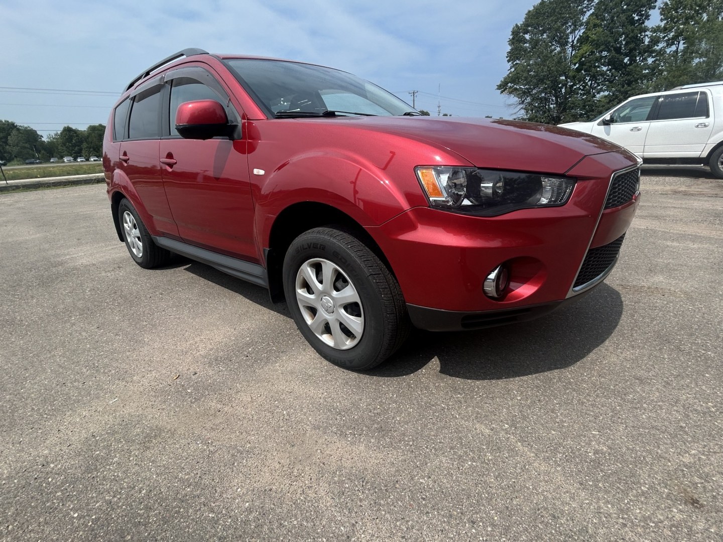 2013 Mitsubishi Outlander ES 2WD (JA4AS2AW1DU) with an 2.4L L4 DOHC 16V engine, 6-Speed Automatic transmission, located at 17255 hwy 65 NE, Ham Lake, MN, 55304, 0.000000, 0.000000- Photo#2