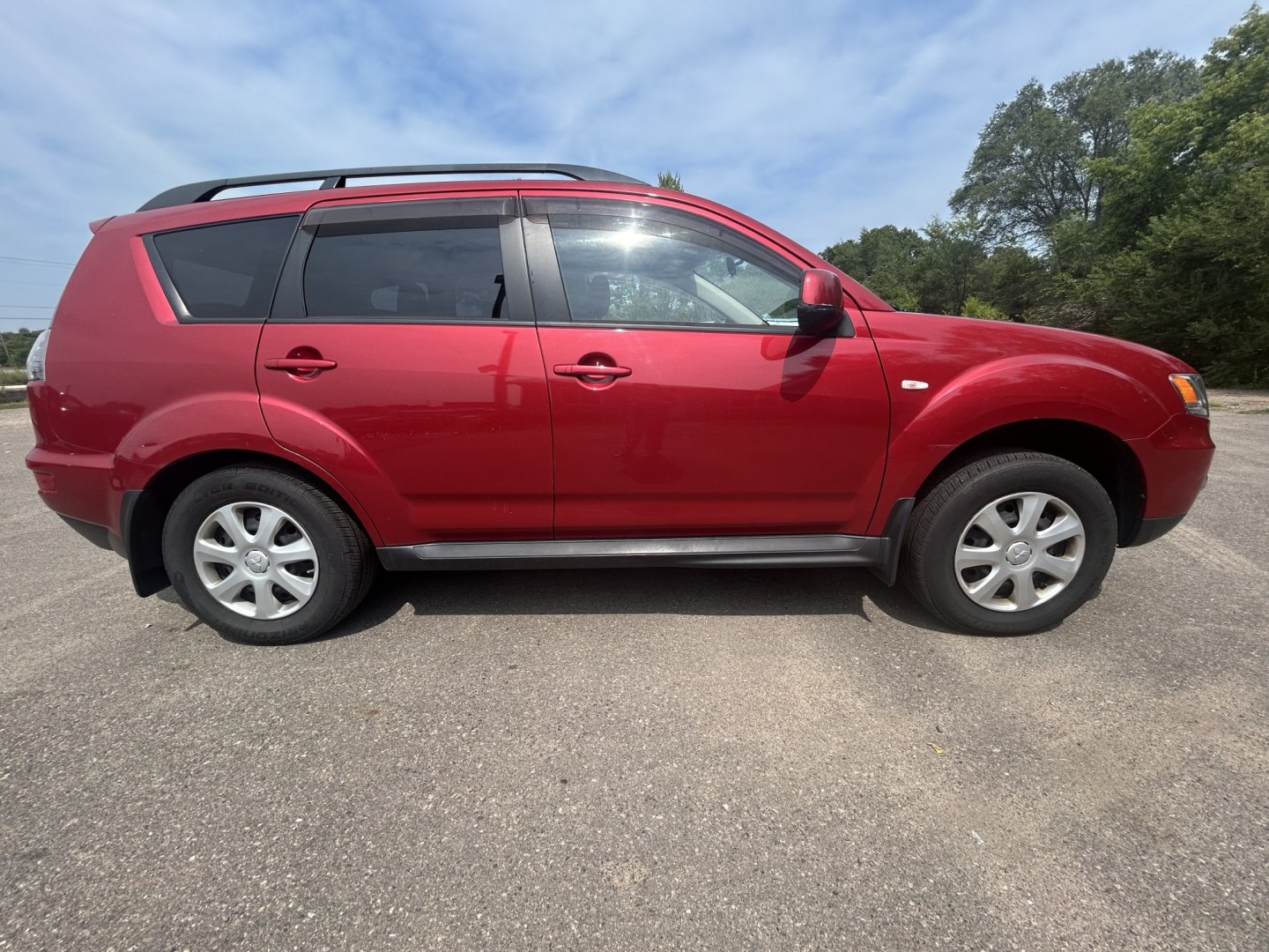 2013 Mitsubishi Outlander ES 2WD (JA4AS2AW1DU) with an 2.4L L4 DOHC 16V engine, 6-Speed Automatic transmission, located at 17255 hwy 65 NE, Ham Lake, MN, 55304, 0.000000, 0.000000- Photo#3