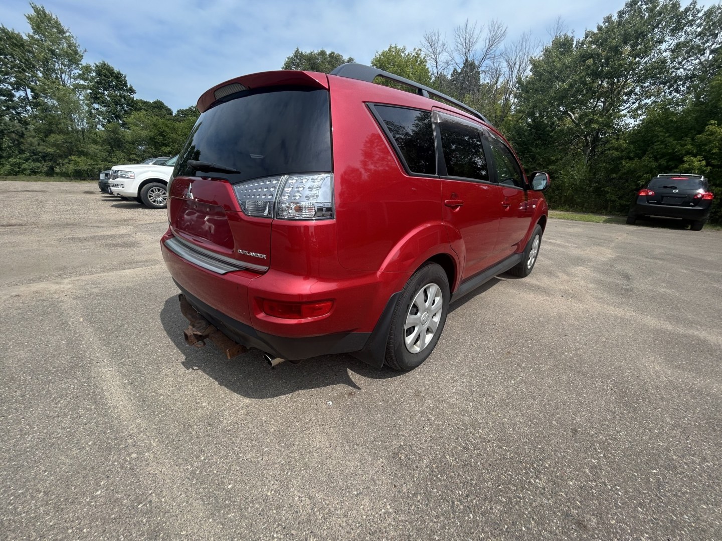 2013 Mitsubishi Outlander ES 2WD (JA4AS2AW1DU) with an 2.4L L4 DOHC 16V engine, 6-Speed Automatic transmission, located at 17255 hwy 65 NE, Ham Lake, MN, 55304, 0.000000, 0.000000- Photo#4