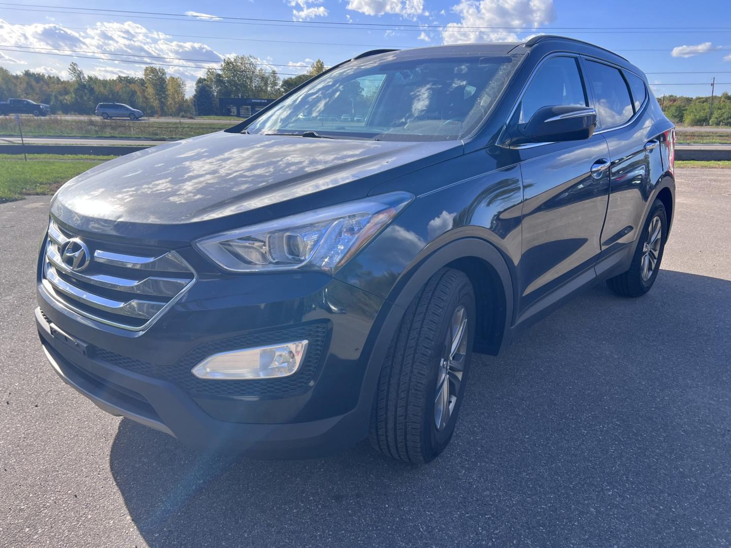 2014 Hyundai Santa Fe Sport 2.4 AWD (5XYZUDLB4EG) with an 2.4L L4 DOHC 16V engine, 6A transmission, located at 17255 hwy 65 NE, Ham Lake, MN, 55304, 0.000000, 0.000000- Photo#0
