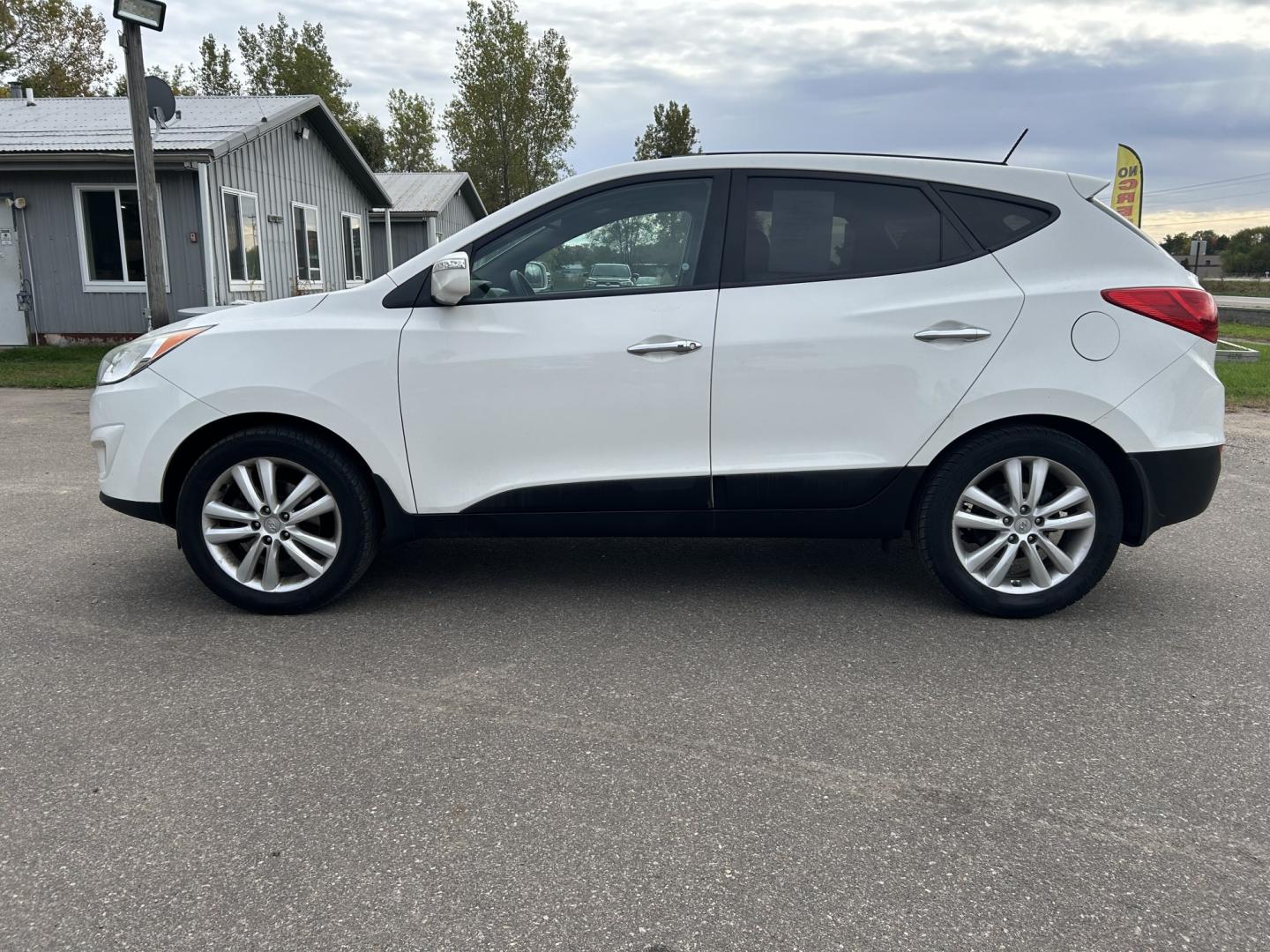 2013 Hyundai Tucson Limited Auto AWD (KM8JUCACXDU) with an 2.4L L4 DOHC 16V engine, 6-Speed Automatic transmission, located at 17255 hwy 65 NE, Ham Lake, MN, 55304, 0.000000, 0.000000- Photo#7