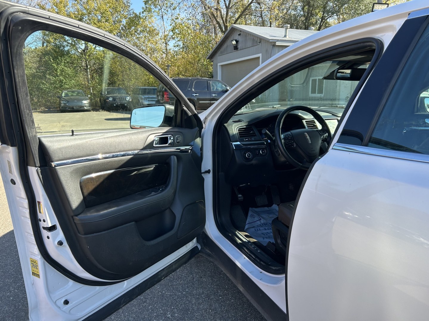 2015 Lincoln MKS FWD (1LNHL9DK3FG) with an 3.7L V6 DOHC 24V engine, 6A transmission, located at 17255 hwy 65 NE, Ham Lake, MN, 55304, 0.000000, 0.000000- Photo#8