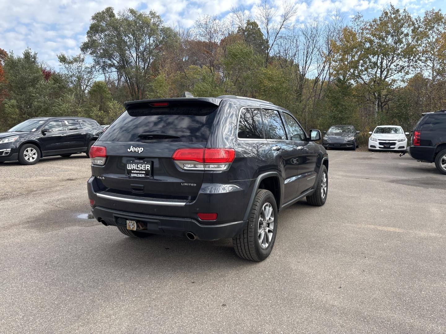 2014 Jeep Grand Cherokee Limited 4WD (1C4RJFBG4EC) with an 3.6L V6 DOHC 24V engine, 5-Speed Automatic transmission, located at 17255 hwy 65 NE, Ham Lake, MN, 55304, 0.000000, 0.000000- Photo#4
