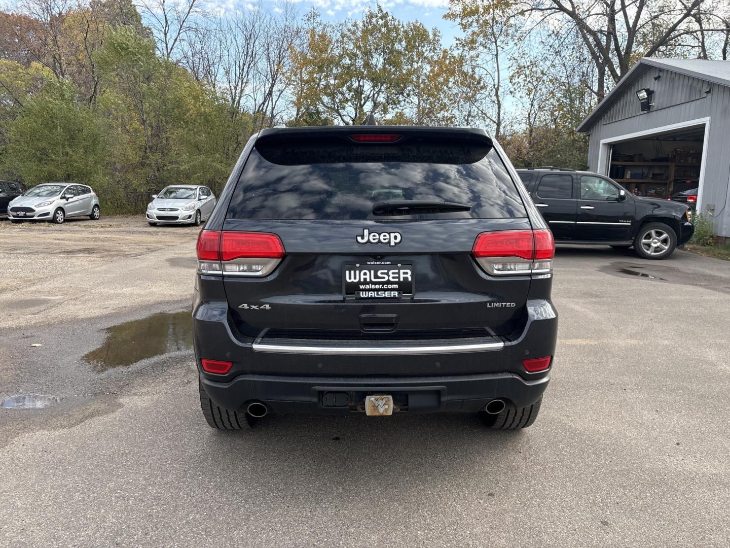 2014 Jeep Grand Cherokee Limited 4WD (1C4RJFBG4EC) with an 3.6L V6 DOHC 24V engine, 5-Speed Automatic transmission, located at 17255 hwy 65 NE, Ham Lake, MN, 55304, 0.000000, 0.000000- Photo#3