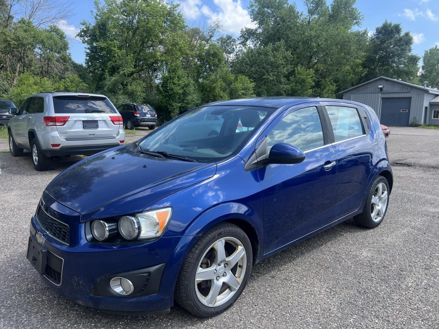 2013 Blue Chevrolet Sonic LTZ Auto 5-Door (1G1JE6SH9D4) with an 1.8L L4 DOHC 24V FFV engine, 6-Speed Automatic transmission, located at 17255 hwy 65 NE, Ham Lake, MN, 55304, 0.000000, 0.000000 - Photo#0