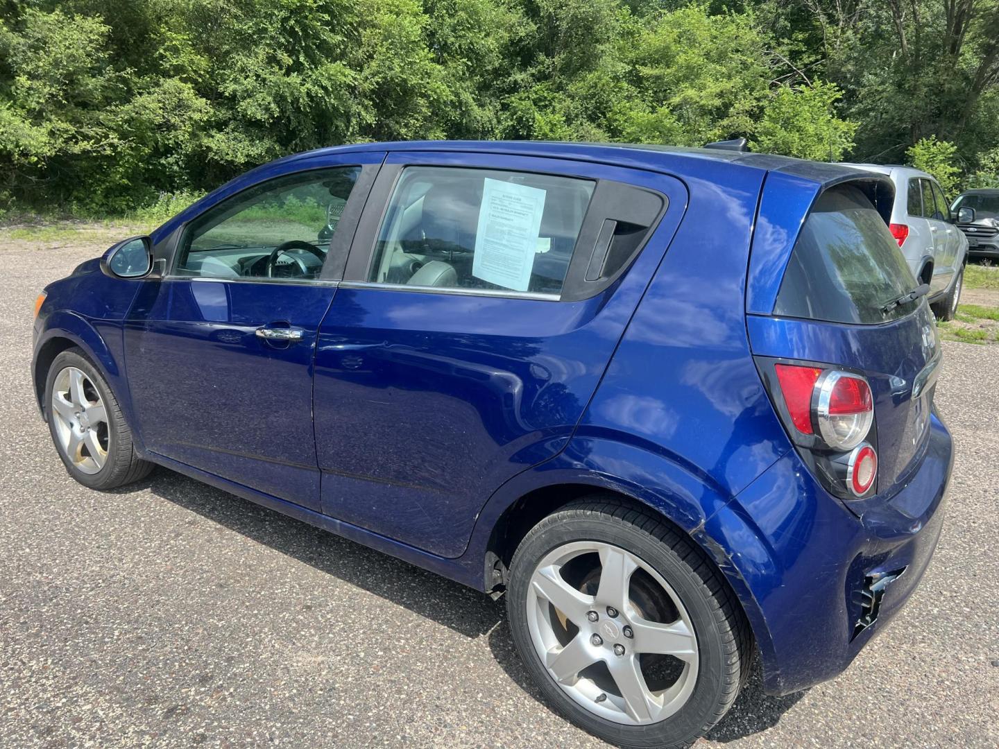 2013 Blue Chevrolet Sonic LTZ Auto 5-Door (1G1JE6SH9D4) with an 1.8L L4 DOHC 24V FFV engine, 6-Speed Automatic transmission, located at 17255 hwy 65 NE, Ham Lake, MN, 55304, 0.000000, 0.000000 - Photo#2