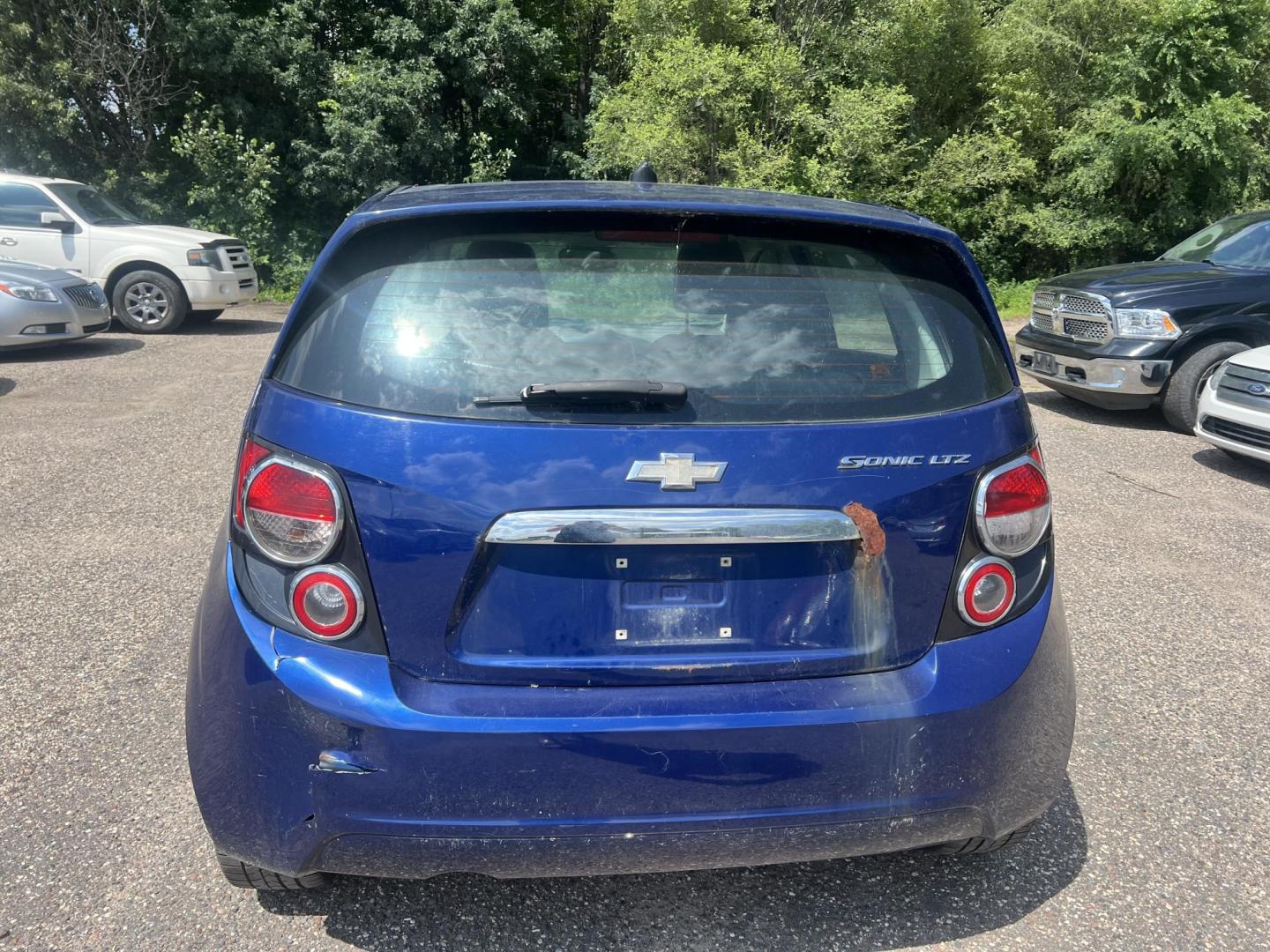 2013 Blue Chevrolet Sonic LTZ Auto 5-Door (1G1JE6SH9D4) with an 1.8L L4 DOHC 24V FFV engine, 6-Speed Automatic transmission, located at 17255 hwy 65 NE, Ham Lake, MN, 55304, 0.000000, 0.000000 - Photo#3
