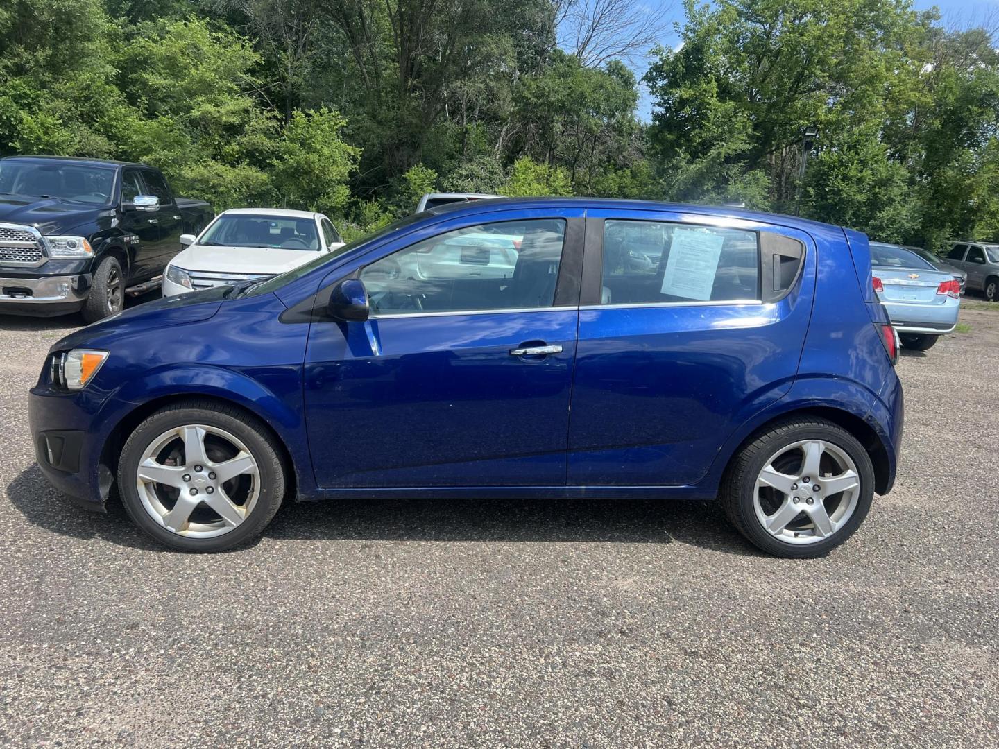 2013 Blue Chevrolet Sonic LTZ Auto 5-Door (1G1JE6SH9D4) with an 1.8L L4 DOHC 24V FFV engine, 6-Speed Automatic transmission, located at 17255 hwy 65 NE, Ham Lake, MN, 55304, 0.000000, 0.000000 - Photo#1