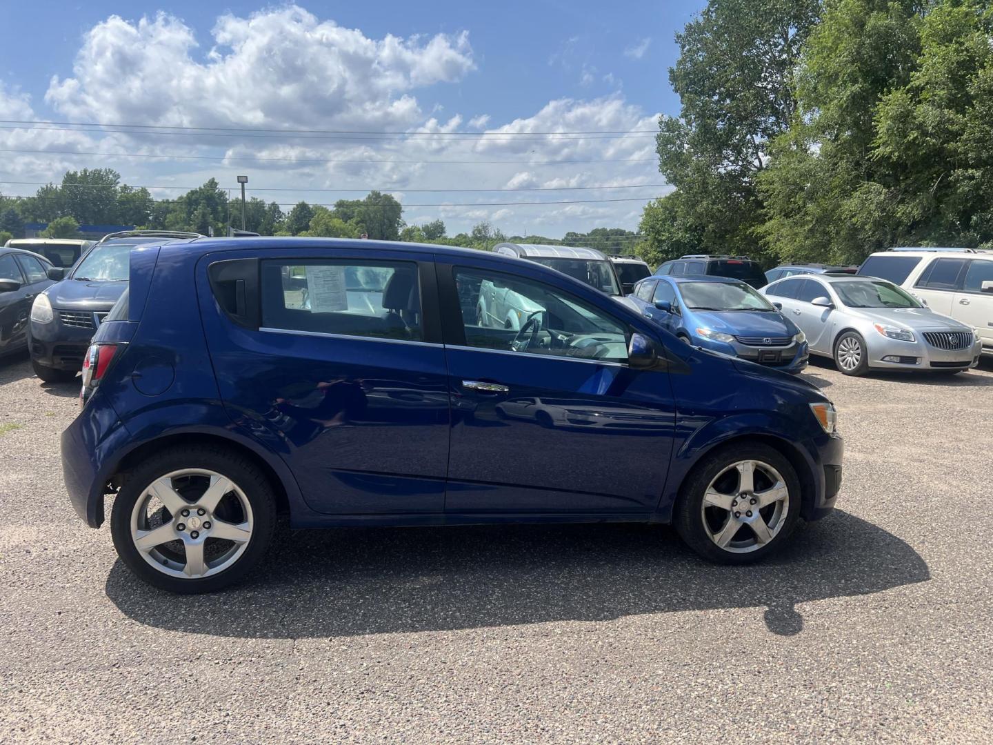 2013 Blue Chevrolet Sonic LTZ Auto 5-Door (1G1JE6SH9D4) with an 1.8L L4 DOHC 24V FFV engine, 6-Speed Automatic transmission, located at 17255 hwy 65 NE, Ham Lake, MN, 55304, 0.000000, 0.000000 - Photo#5