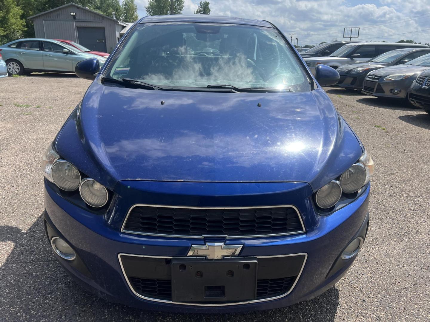 2013 Blue Chevrolet Sonic LTZ Auto 5-Door (1G1JE6SH9D4) with an 1.8L L4 DOHC 24V FFV engine, 6-Speed Automatic transmission, located at 17255 hwy 65 NE, Ham Lake, MN, 55304, 0.000000, 0.000000 - Photo#7