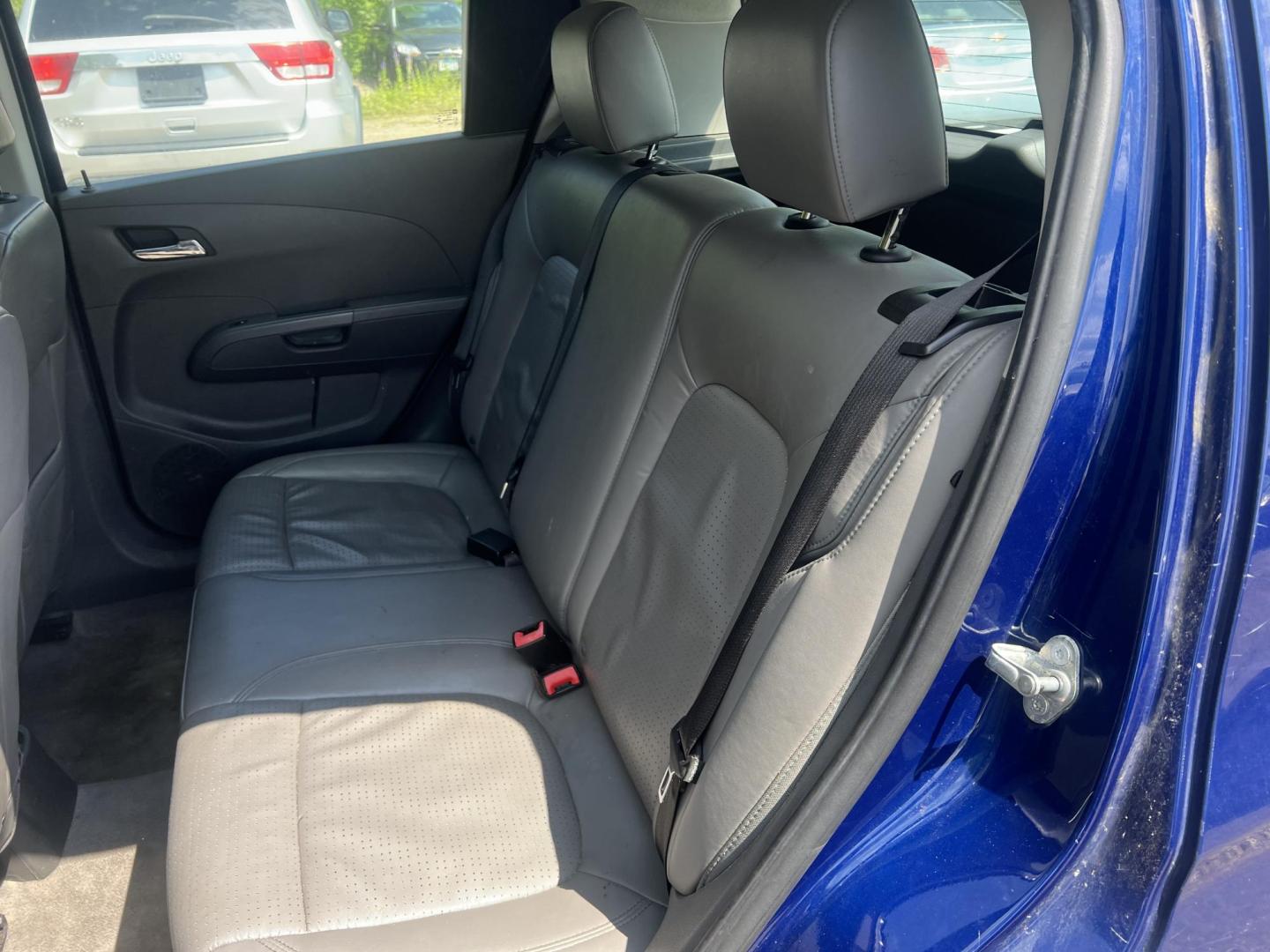 2013 Blue Chevrolet Sonic LTZ Auto 5-Door (1G1JE6SH9D4) with an 1.8L L4 DOHC 24V FFV engine, 6-Speed Automatic transmission, located at 17255 hwy 65 NE, Ham Lake, MN, 55304, 0.000000, 0.000000 - Photo#11