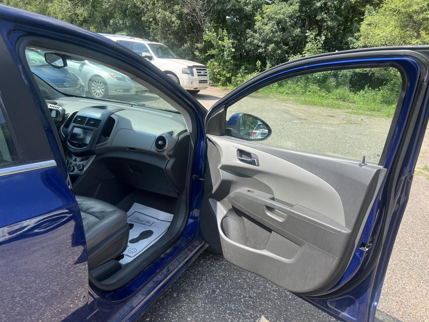 2013 Blue Chevrolet Sonic LTZ Auto 5-Door (1G1JE6SH9D4) with an 1.8L L4 DOHC 24V FFV engine, 6-Speed Automatic transmission, located at 17255 hwy 65 NE, Ham Lake, MN, 55304, 0.000000, 0.000000 - Photo#14