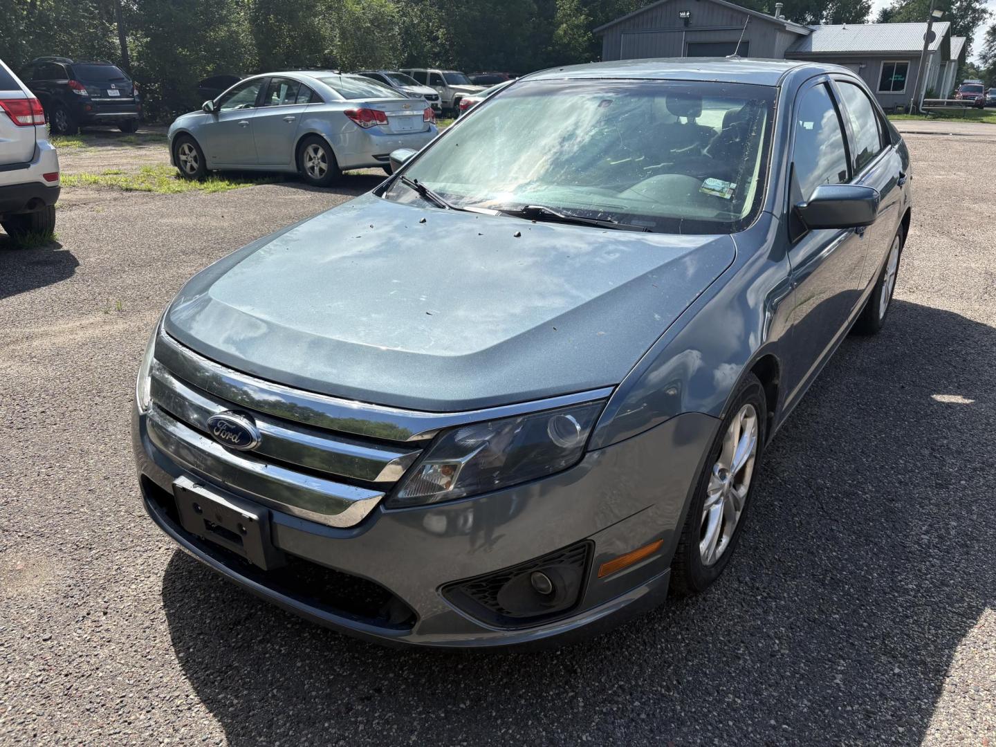 2012 Blue Ford Fusion SE (3FAHP0HA0CR) with an 2.5L L4 DOHC 16V engine, located at 17255 hwy 65 NE, Ham Lake, MN, 55304, 0.000000, 0.000000 - Photo#0