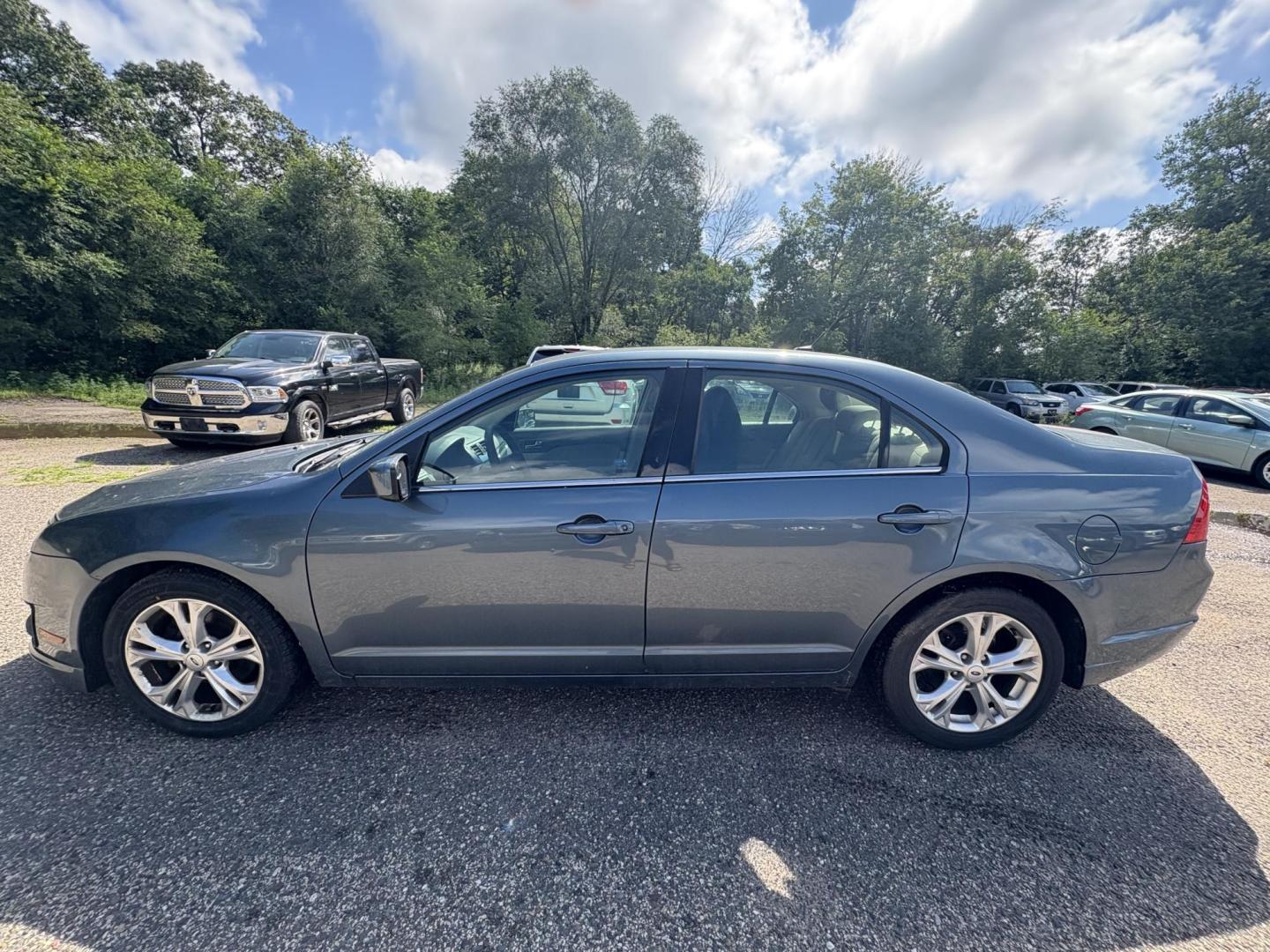 2012 Blue Ford Fusion SE (3FAHP0HA0CR) with an 2.5L L4 DOHC 16V engine, located at 17255 hwy 65 NE, Ham Lake, MN, 55304, 0.000000, 0.000000 - Photo#1