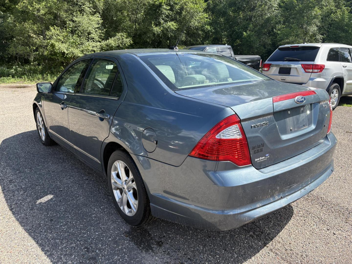 2012 Blue Ford Fusion SE (3FAHP0HA0CR) with an 2.5L L4 DOHC 16V engine, located at 17255 hwy 65 NE, Ham Lake, MN, 55304, 0.000000, 0.000000 - Photo#2