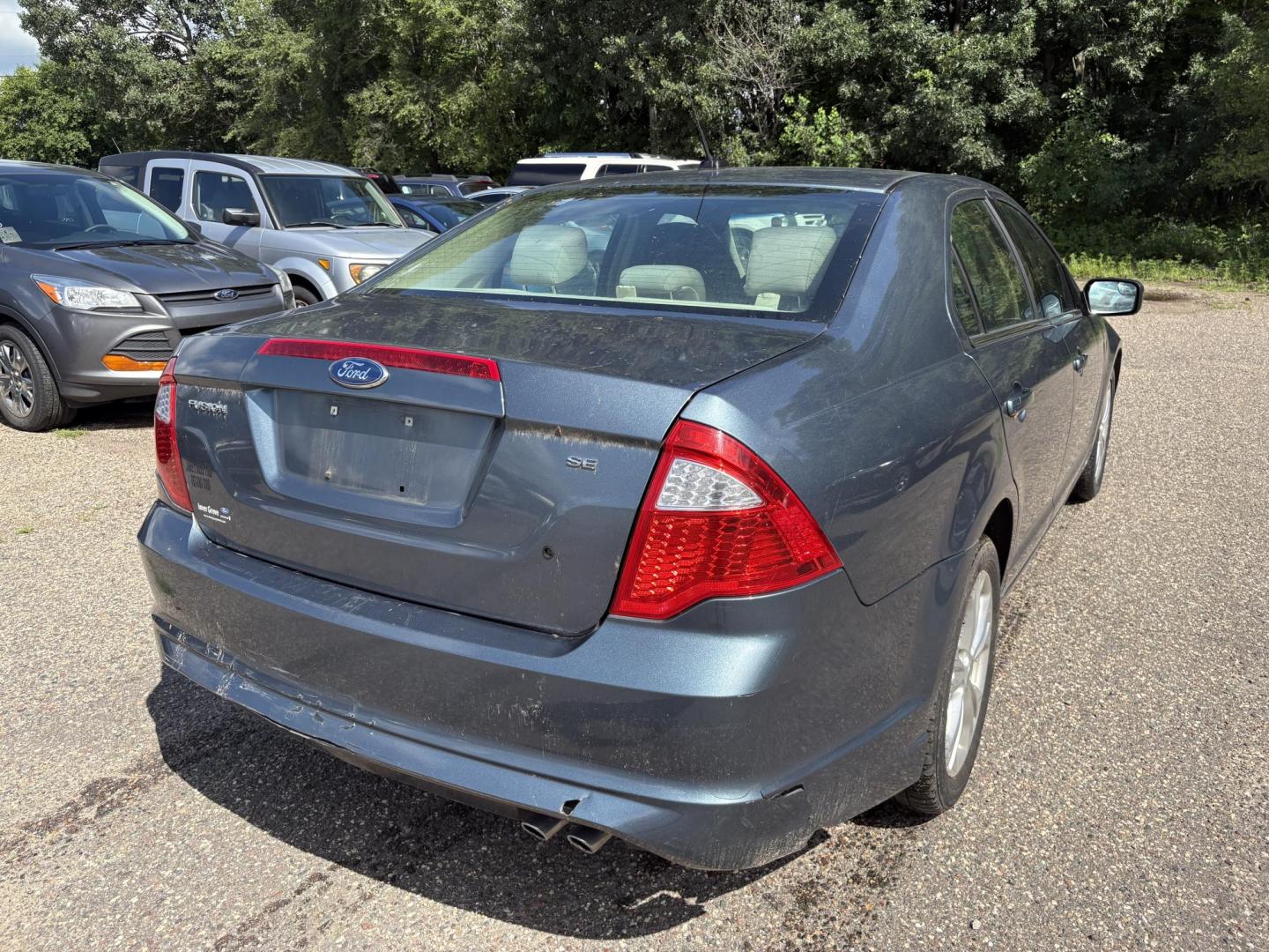 2012 Blue Ford Fusion SE (3FAHP0HA0CR) with an 2.5L L4 DOHC 16V engine, located at 17255 hwy 65 NE, Ham Lake, MN, 55304, 0.000000, 0.000000 - Photo#4