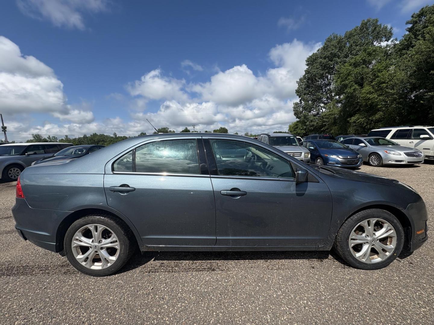 2012 Blue Ford Fusion SE (3FAHP0HA0CR) with an 2.5L L4 DOHC 16V engine, located at 17255 hwy 65 NE, Ham Lake, MN, 55304, 0.000000, 0.000000 - Photo#5