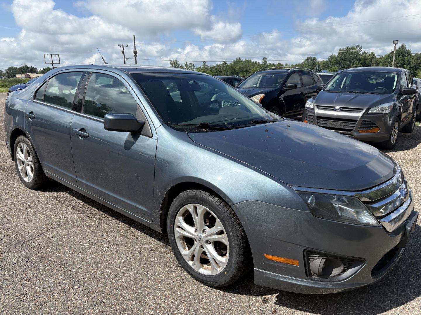 2012 Blue Ford Fusion SE (3FAHP0HA0CR) with an 2.5L L4 DOHC 16V engine, located at 17255 hwy 65 NE, Ham Lake, MN, 55304, 0.000000, 0.000000 - Photo#6