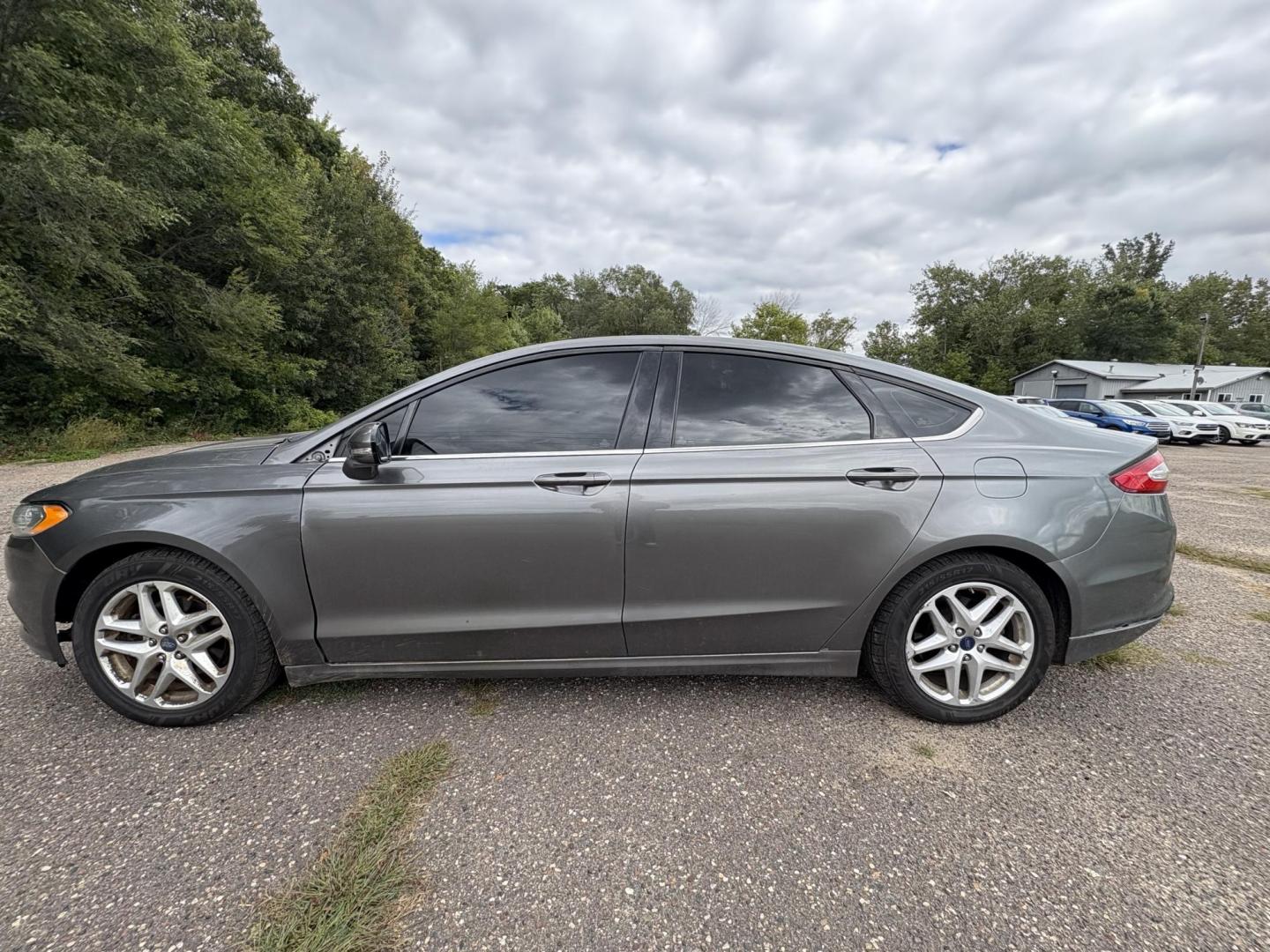 2013 Gray Ford Fusion SE (3FA6P0H74DR) with an 2.5L L4 DOHC 16V engine, located at 17255 hwy 65 NE, Ham Lake, MN, 55304, 0.000000, 0.000000 - Photo#1
