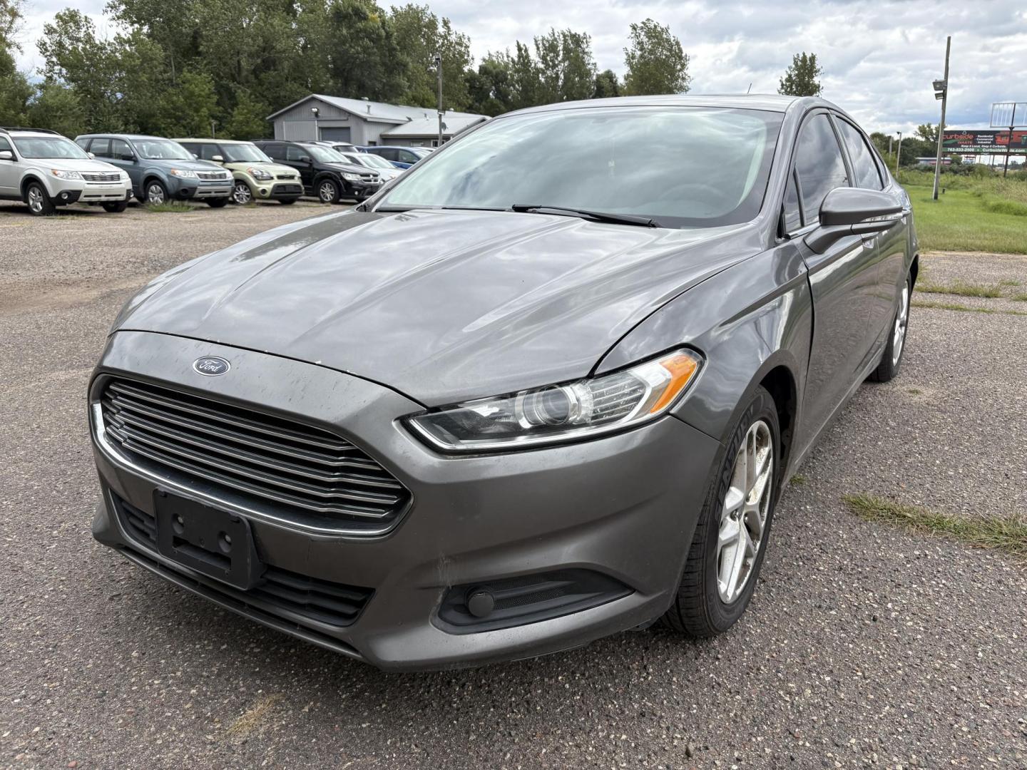 2013 Gray Ford Fusion SE (3FA6P0H74DR) with an 2.5L L4 DOHC 16V engine, located at 17255 hwy 65 NE, Ham Lake, MN, 55304, 0.000000, 0.000000 - Photo#0