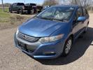 2010 Blue Honda Insight LX (JHMZE2H58AS) with an 1.3L L4 SOHC 8V HYBRID engine, Continuously Variable Transmisson transmission, located at 17255 hwy 65 NE, Ham Lake, MN, 55304, 0.000000, 0.000000 - Photo#0