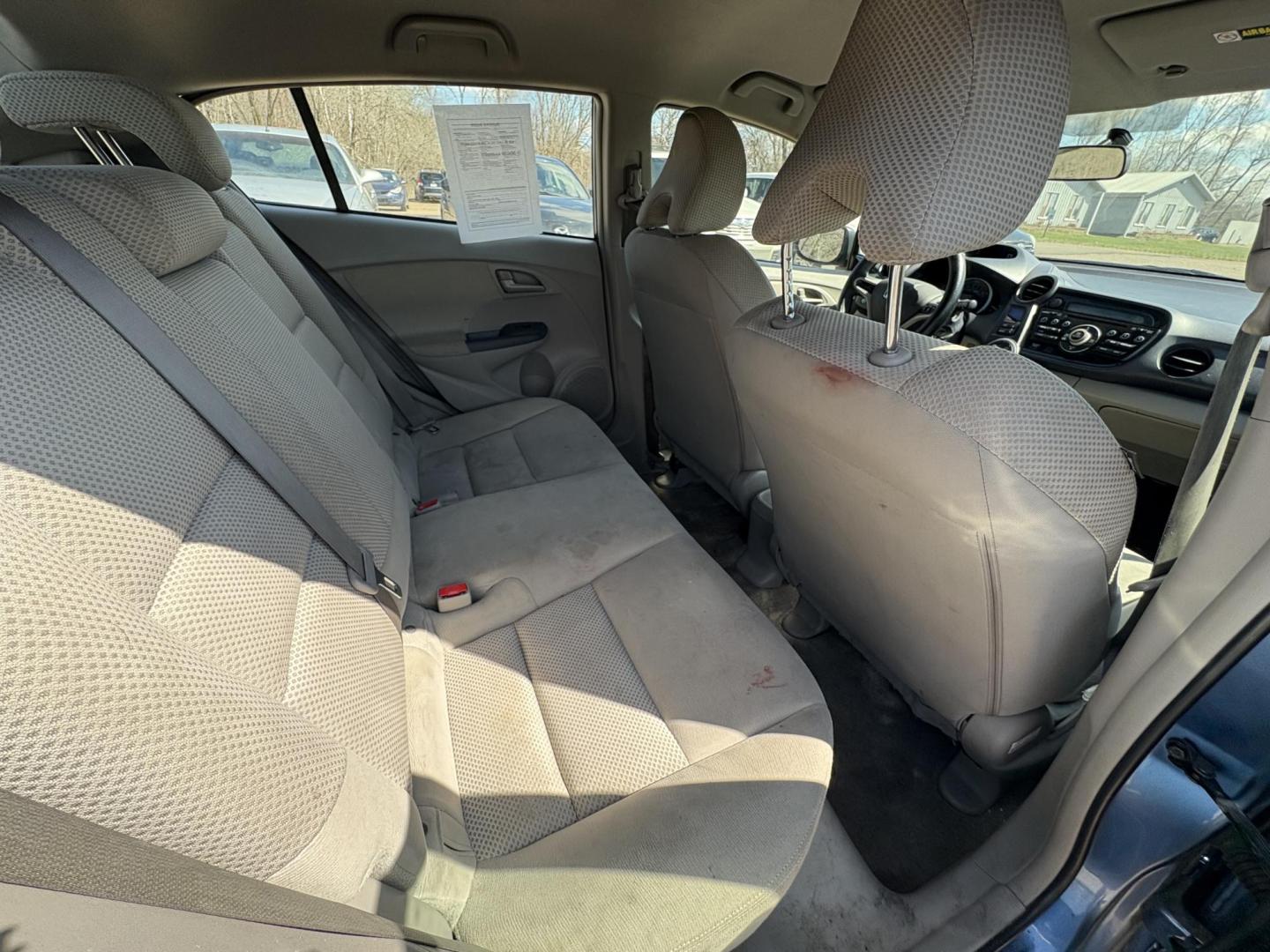 2010 Blue Honda Insight LX (JHMZE2H58AS) with an 1.3L L4 SOHC 8V HYBRID engine, Continuously Variable Transmisson transmission, located at 17255 hwy 65 NE, Ham Lake, MN, 55304, 0.000000, 0.000000 - Photo#13